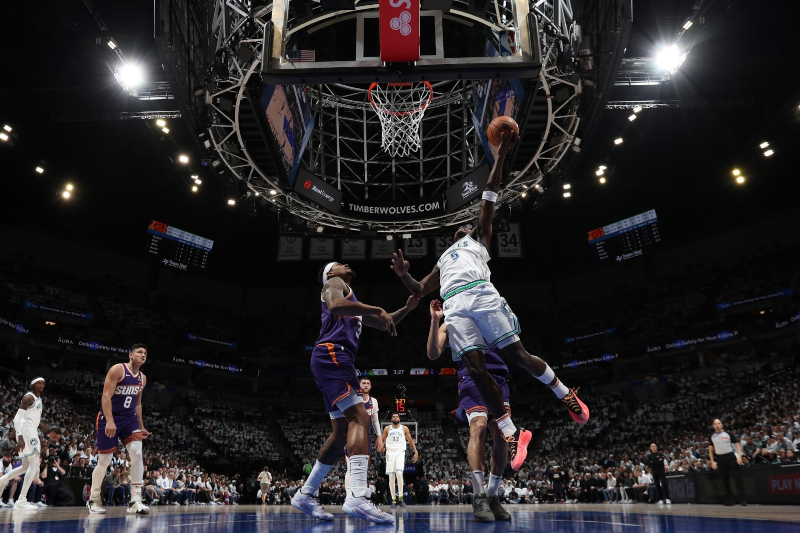 MINNEAPOLIS, MN - APRIL 20: Anthony Edwards #5 of the Minnesota Timberwolves drives to the basket during Round One Game One of the 2024 NBA Playoffs against the Phoenix Suns on April 20, 2024 at Target Center in Minneapolis, Minnesota. NOTE TO USER: User expressly acknowledges and agrees that, by downloading and or using this Photograph, user is consenting to the terms and conditions of the Getty Images License Agreement. Mandatory Copyright Notice: Copyright 2024 NBAE (Photo by Jordan Johnson/NBAE via Getty Images) MINNEAPOLIS, MN - APRIL 20: Anthony Edwards #5 of the Minnesota Timberwolves drives to the basket during Round One Game One of the 2024 NBA Playoffs against the Phoenix Suns on April 20, 2024 at Target Center in Minneapolis, Minnesota. NOTE TO USER: User expressly acknowledges and agrees that, by downloading and or using this Photograph, user is consenting to the terms and conditions of the Getty Images License Agreement. Mandatory Copyright Notice: Copyright 2024 NBAE (Photo by Jordan Johnson/NBAE via Getty Images)