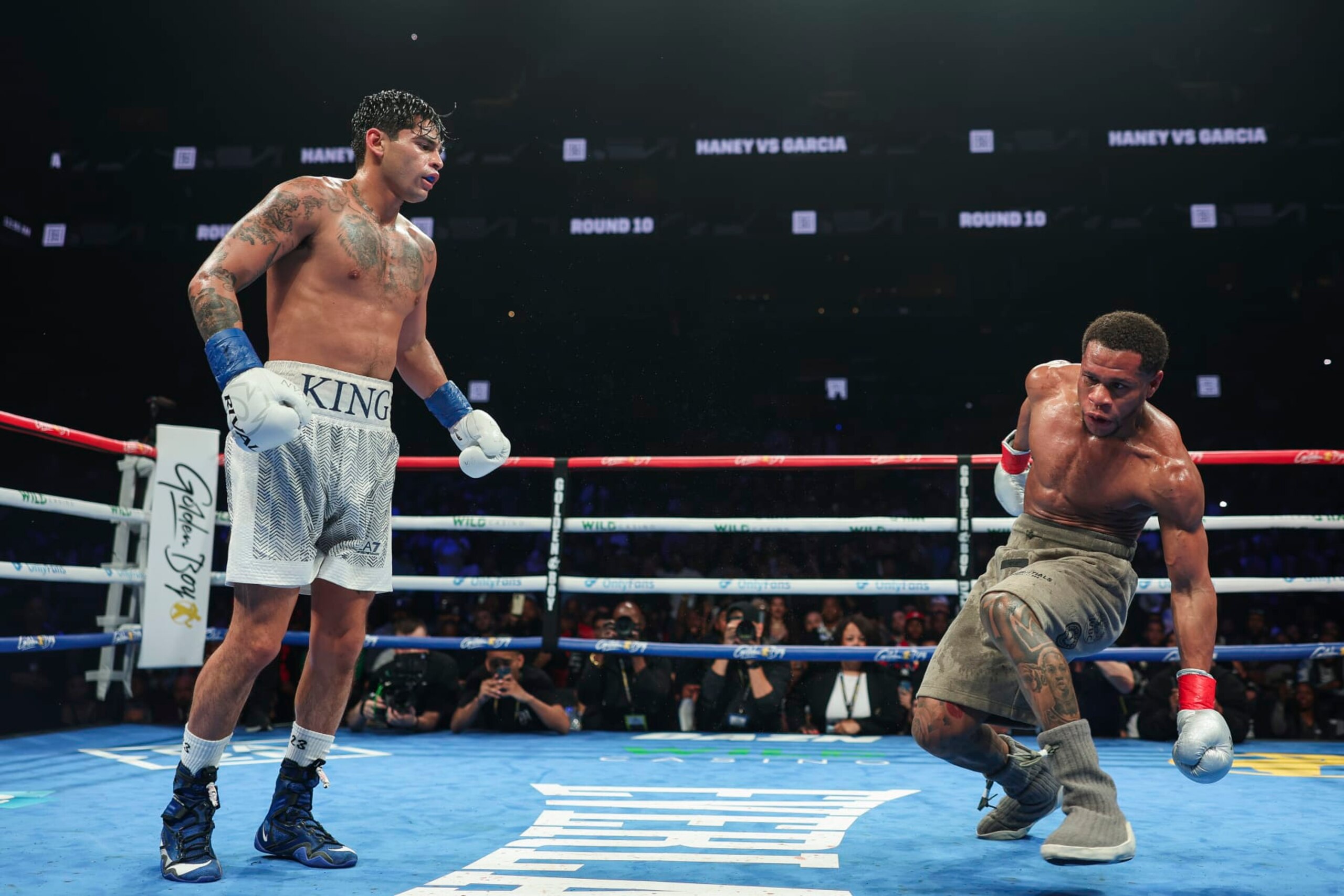NEW YORK, NEW YORK - APRIL 20: Ryan Garcia knocks down Devin Haney during a fight at Barclays Center on April 20, 2024 in New York City.  (Photo by Cris Esqueda/Golden Boy/Getty Images)