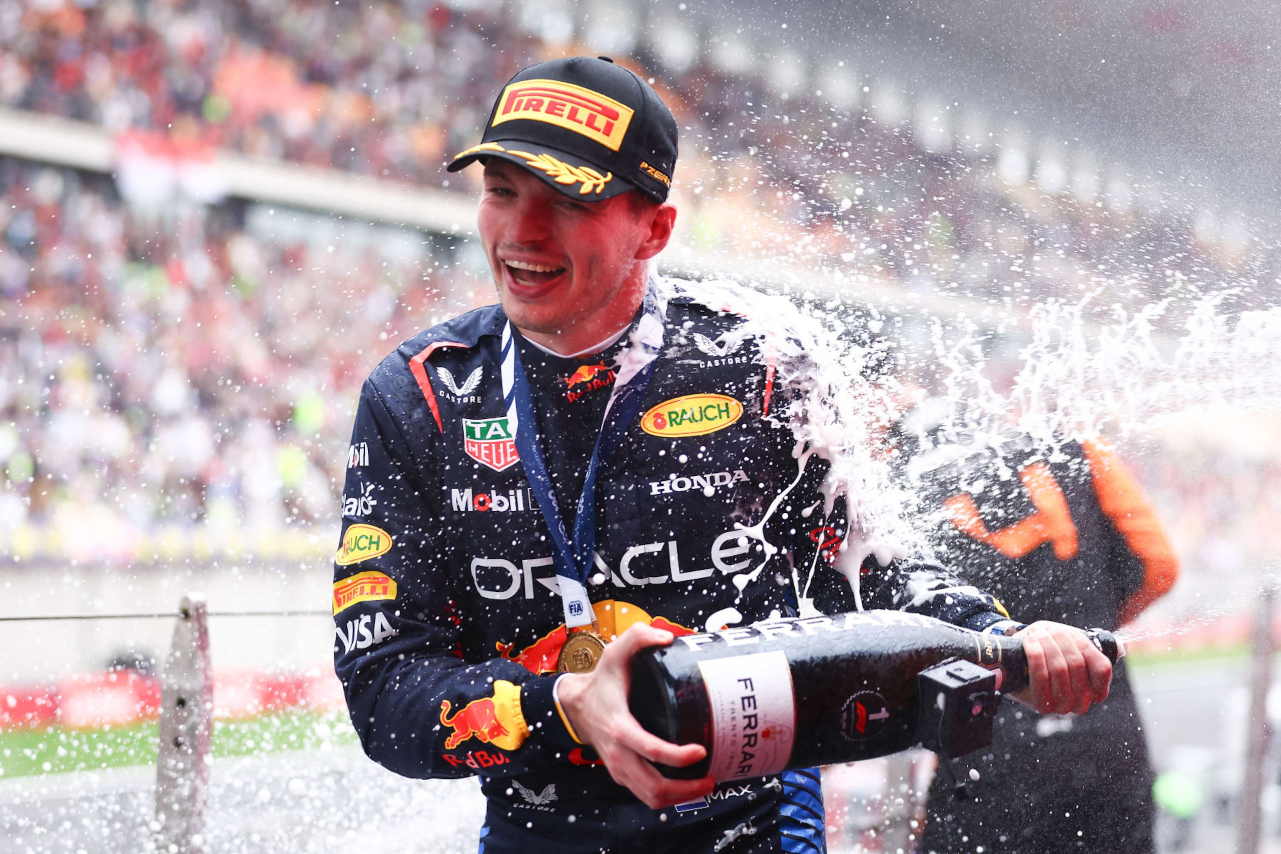SHANGHAI, CHINA - APRIL 21: Race winner Max Verstappen of the Netherlands and Oracle Red Bull Racing celebrates on the podium after the F1 Grand Prix of China at Shanghai International Circuit on April 21, 2024 in Shanghai, China. (Photo by Bryn Lennon - Formula 1/Formula 1 via Getty Images) SHANGHAI, CHINA - APRIL 21: Race winner Max Verstappen of the Netherlands and Oracle Red Bull Racing celebrates on the podium after the F1 Grand Prix of China at Shanghai International Circuit on April 21, 2024 in Shanghai, China. (Photo by Bryn Lennon - Formula 1/Formula 1 via Getty Images)