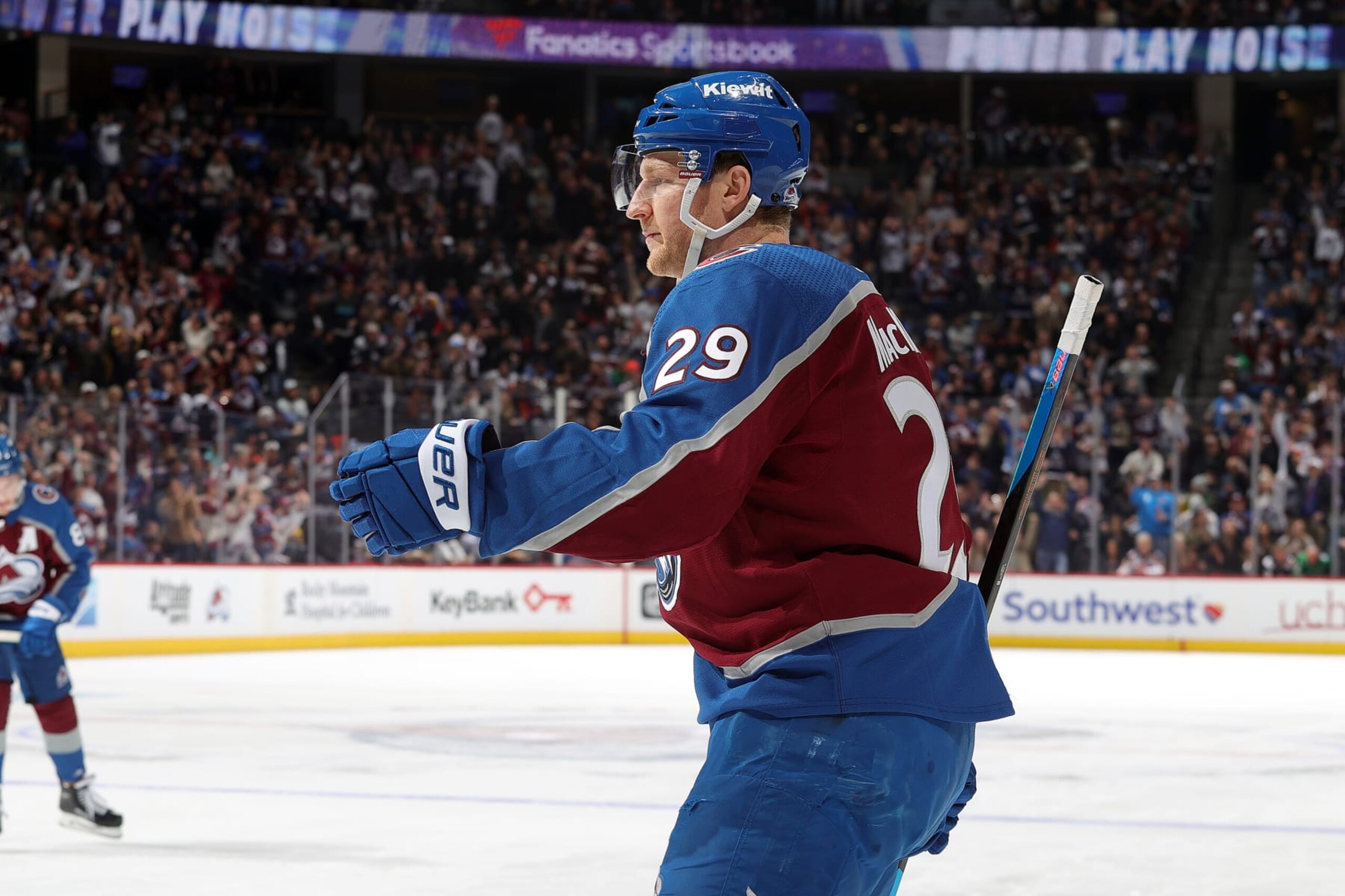 DENVER, COLORADO - APRIL 18: Nathan MacKinnon #29 of the Colorado Avalanche celebrates breaking the franchise record for most points in a season on an assist to Valeri Nichushkin #13 against the Edmonton Oilers in the first period at Ball Arena on April 18, 2024 in Denver, Colorado. (Photo by Michael Martin/NHLI via Getty Images)
