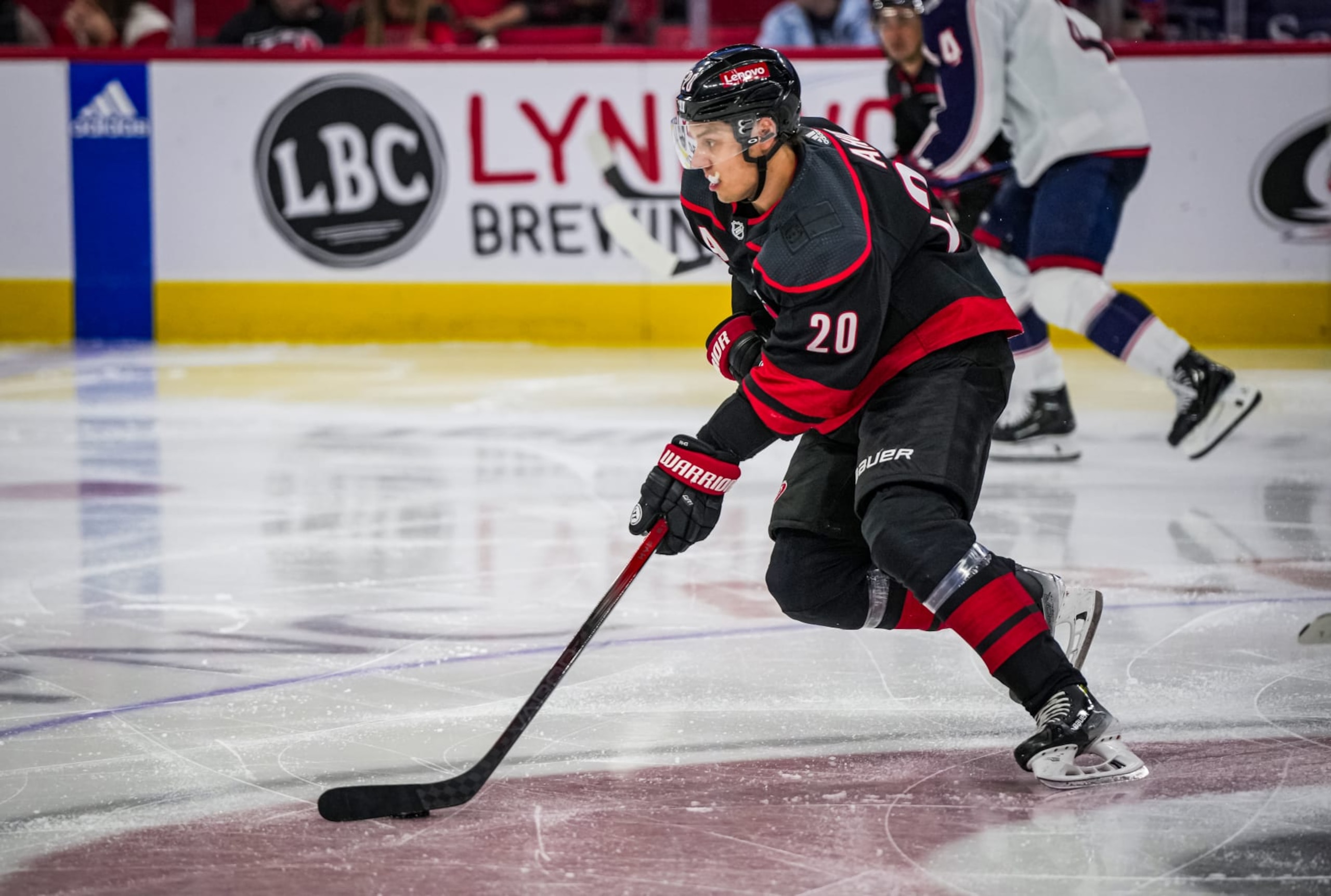 RALEIGH, NORTH CAROLINA - APRIL 07:  Sebastian Aho #20 of the Carolina Hurricanes skates during the second period against the Columbus Blue Jackets at PNC Arena on April 7, 2024 in Raleigh, North Carolina. (Photo by Josh Lavallee/NHLI via Getty Images)