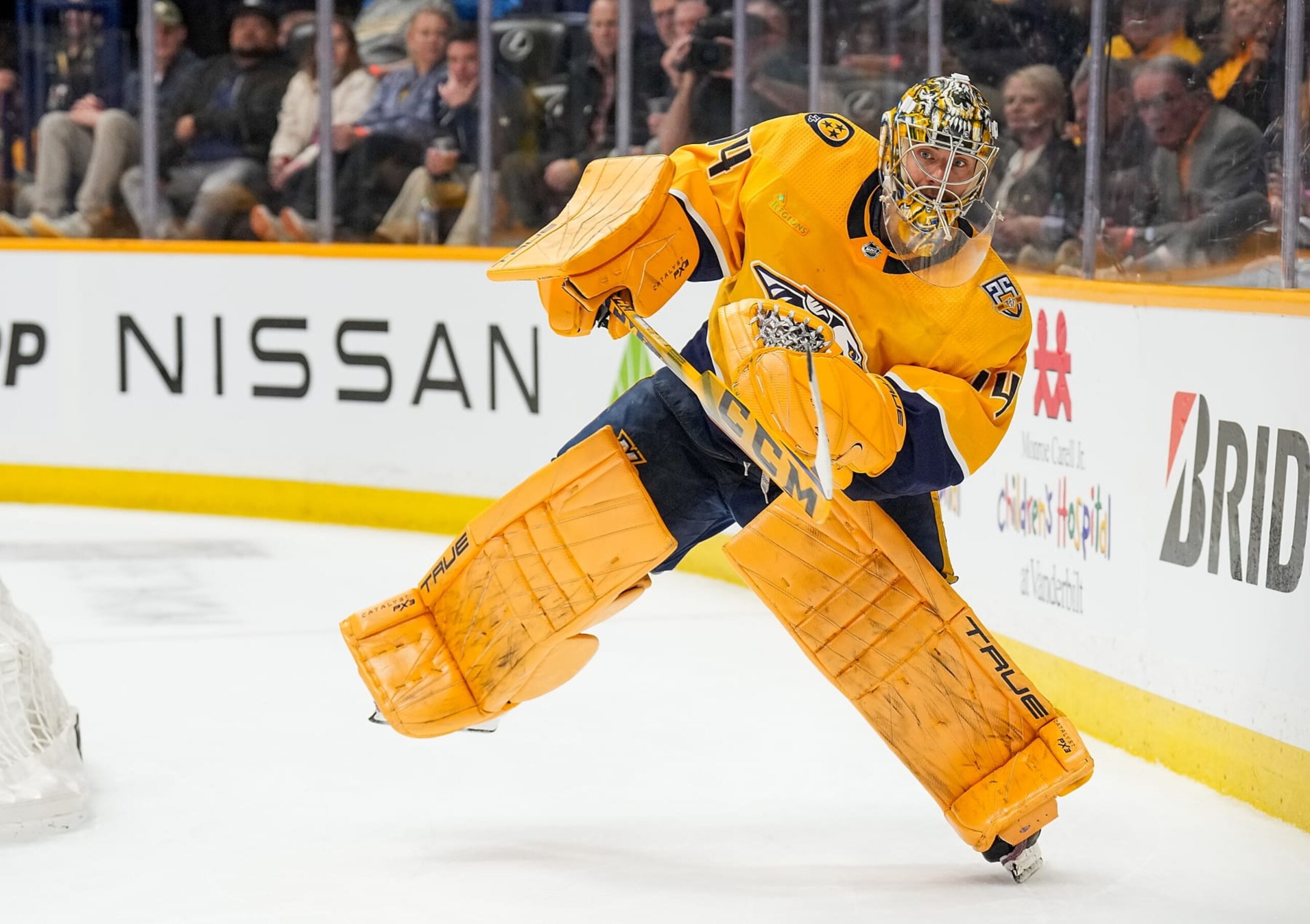 NASHVILLE, TENNESSEE - APRIL 2: Juuse Saros #74 of the Nashville Predators clears the puck against the Boston Bruins during an NHL game at Bridgestone Arena on April 2, 2024 in Nashville, Tennessee. (Photo by John Russell/NHLI via Getty Images)