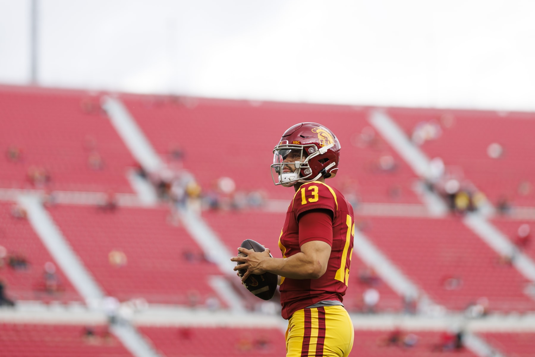 LOS ANGELES, CALIFORNIA - NOVEMBER 18: Caleb Williams #13 of the USC Trojans looks to throw a pass prior to a game against the UCLA Bruins at United Airlines Field at the Los Angeles Memorial Coliseum on November 18, 2023 in Los Angeles, California. (Photo by Ryan Kang/Getty Images)