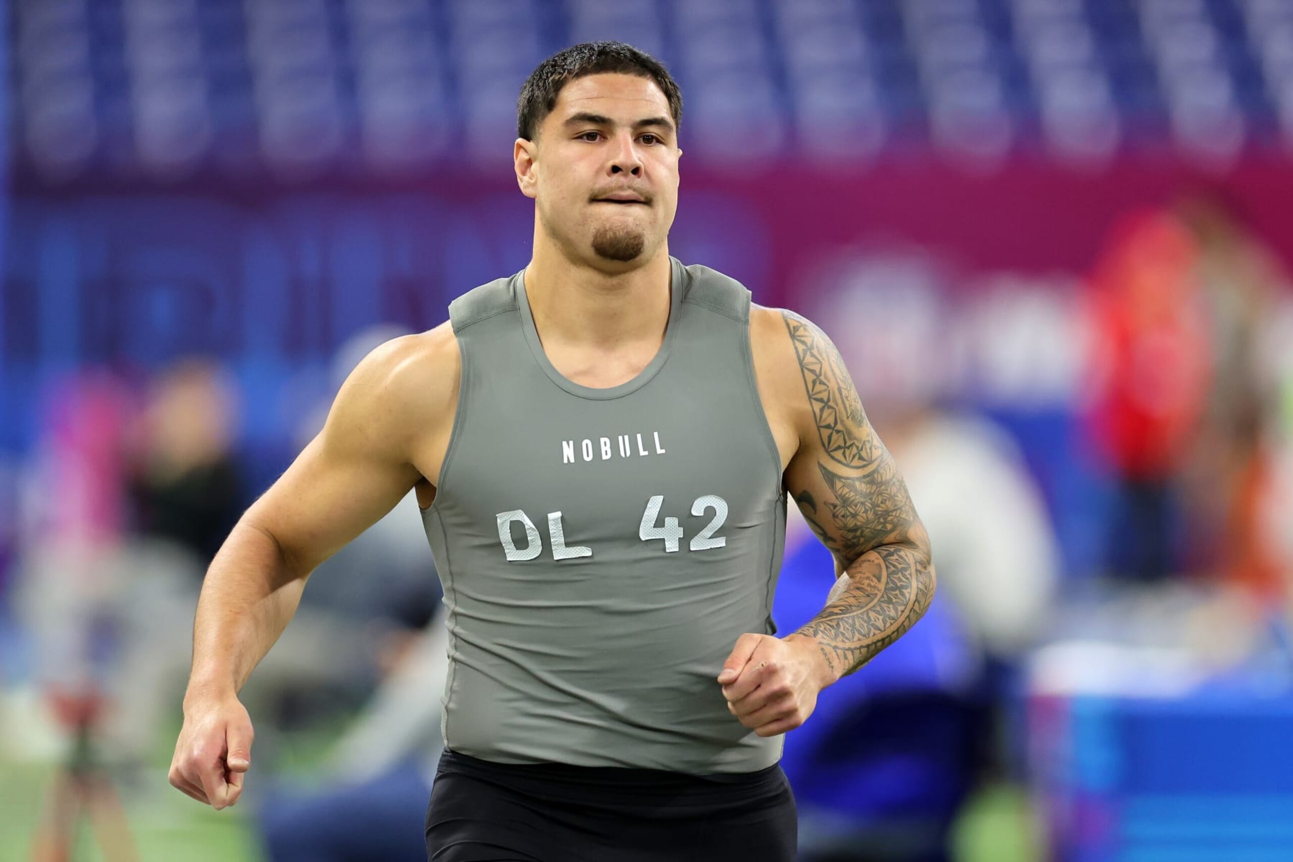 INDIANAPOLIS, INDIANA - FEBRUARY 29: Laiatu Latu #DL42 of UCLA participates in the 40-yard dash during the NFL Combine at Lucas Oil Stadium on February 29, 2024 in Indianapolis, Indiana. (Photo by Stacy Revere/Getty Images) INDIANAPOLIS, INDIANA - FEBRUARY 29: Laiatu Latu #DL42 of UCLA participates in the 40-yard dash during the NFL Combine at Lucas Oil Stadium on February 29, 2024 in Indianapolis, Indiana. (Photo by Stacy Revere/Getty Images)