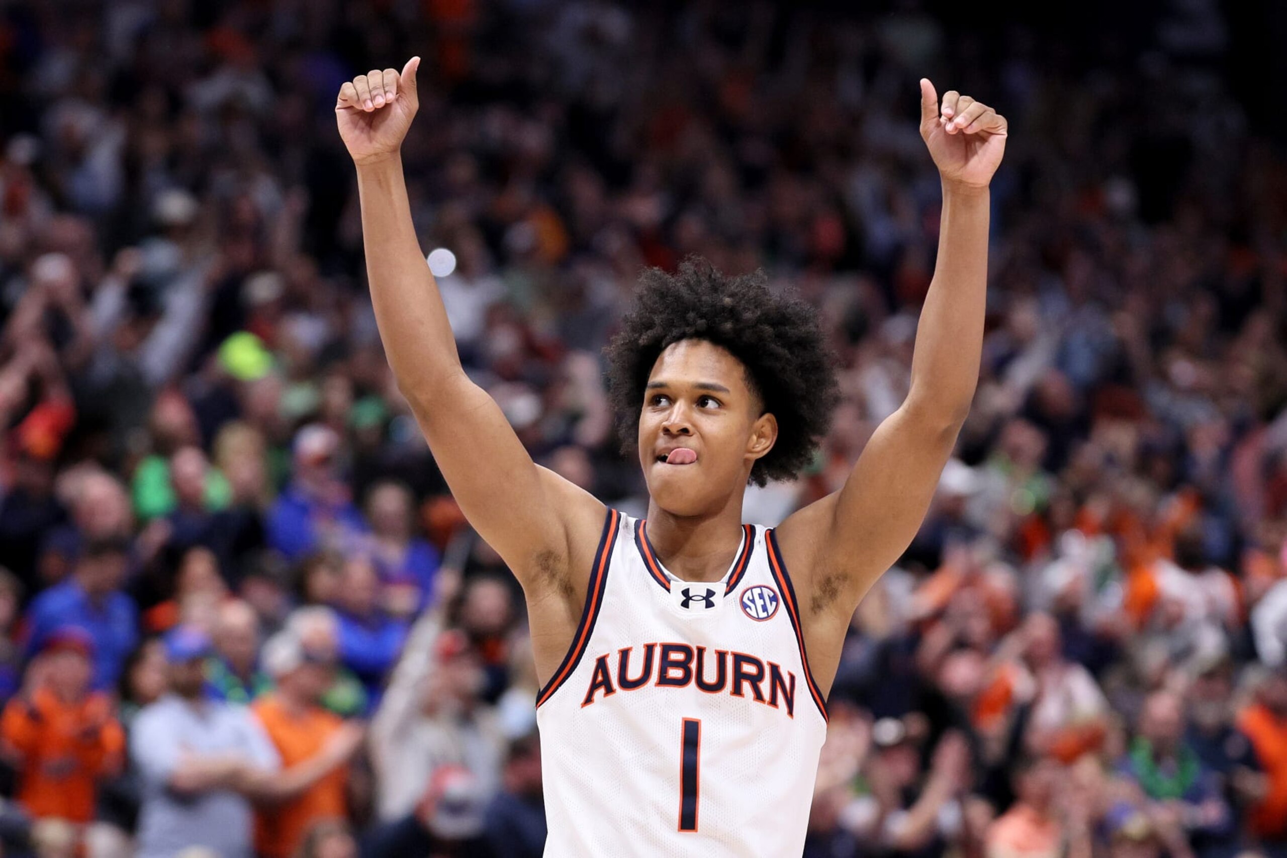 NASHVILLE, TENNESSEE - MARCH 17: Aden Holloway #1 of the Auburn Tigers celebrates against the Florida Gators during the second half of the SEC Tournament Championship game at Bridgestone Arena on March 17, 2024 in Nashville, Tennessee. (Photo by Andy Lyons/Getty Images) NASHVILLE, TENNESSEE - MARCH 17: Aden Holloway #1 of the Auburn Tigers celebrates against the Florida Gators during the second half of the SEC Tournament Championship game at Bridgestone Arena on March 17, 2024 in Nashville, Tennessee. (Photo by Andy Lyons/Getty Images)