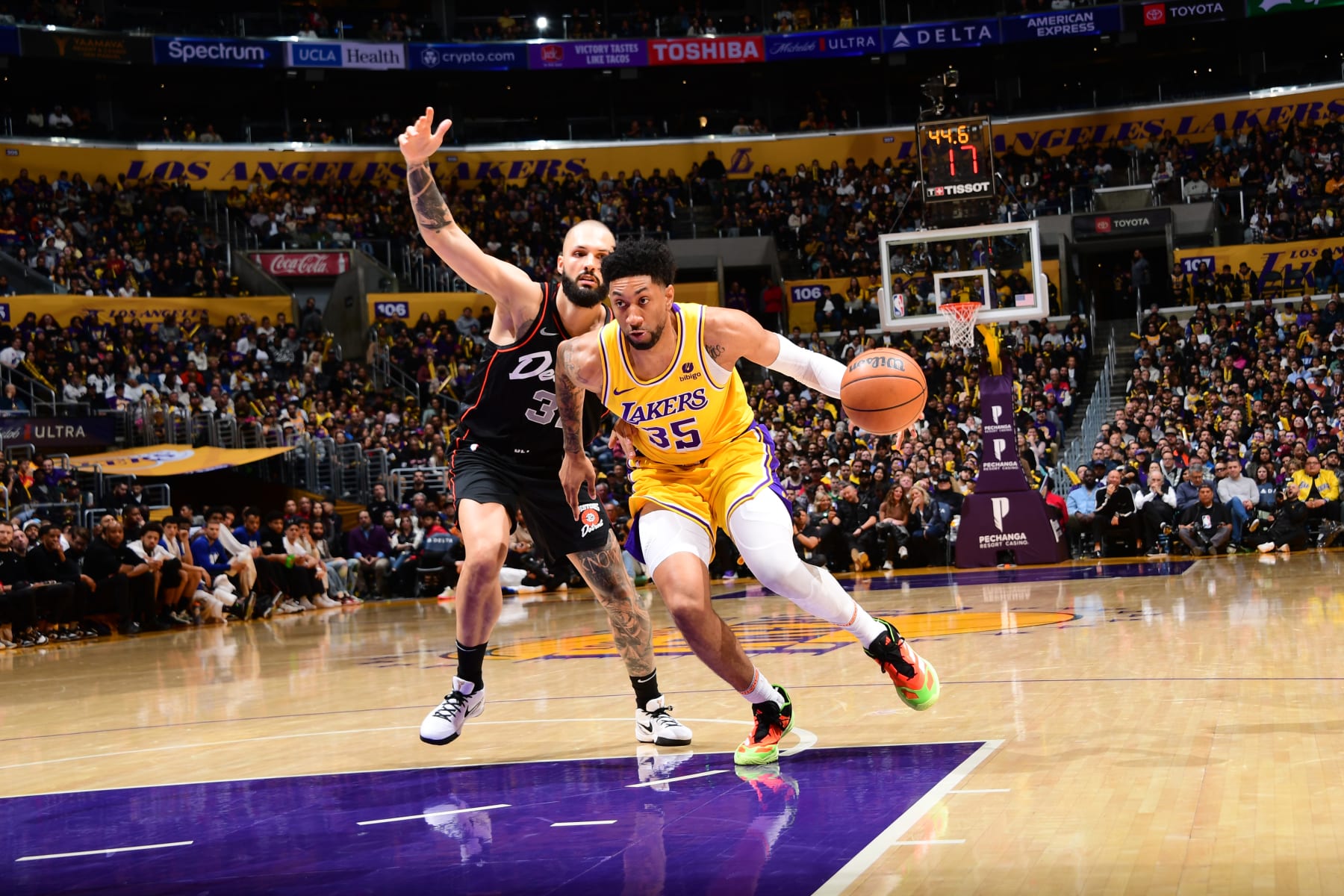 LOS ANGELES, CA - FEBRUARY 13: Christian Wood #35 of the Los Angeles Lakers dribbles the ball during the game against the Detroit Pistons on February 13, 2024 at Crypto.Com Arena in Los Angeles, California. NOTE TO USER: User expressly acknowledges and agrees that, by downloading and/or using this Photograph, user is consenting to the terms and conditions of the Getty Images License Agreement. Mandatory Copyright Notice: Copyright 2024 NBAE (Photo by Adam Pantozzi/NBAE via Getty Images)