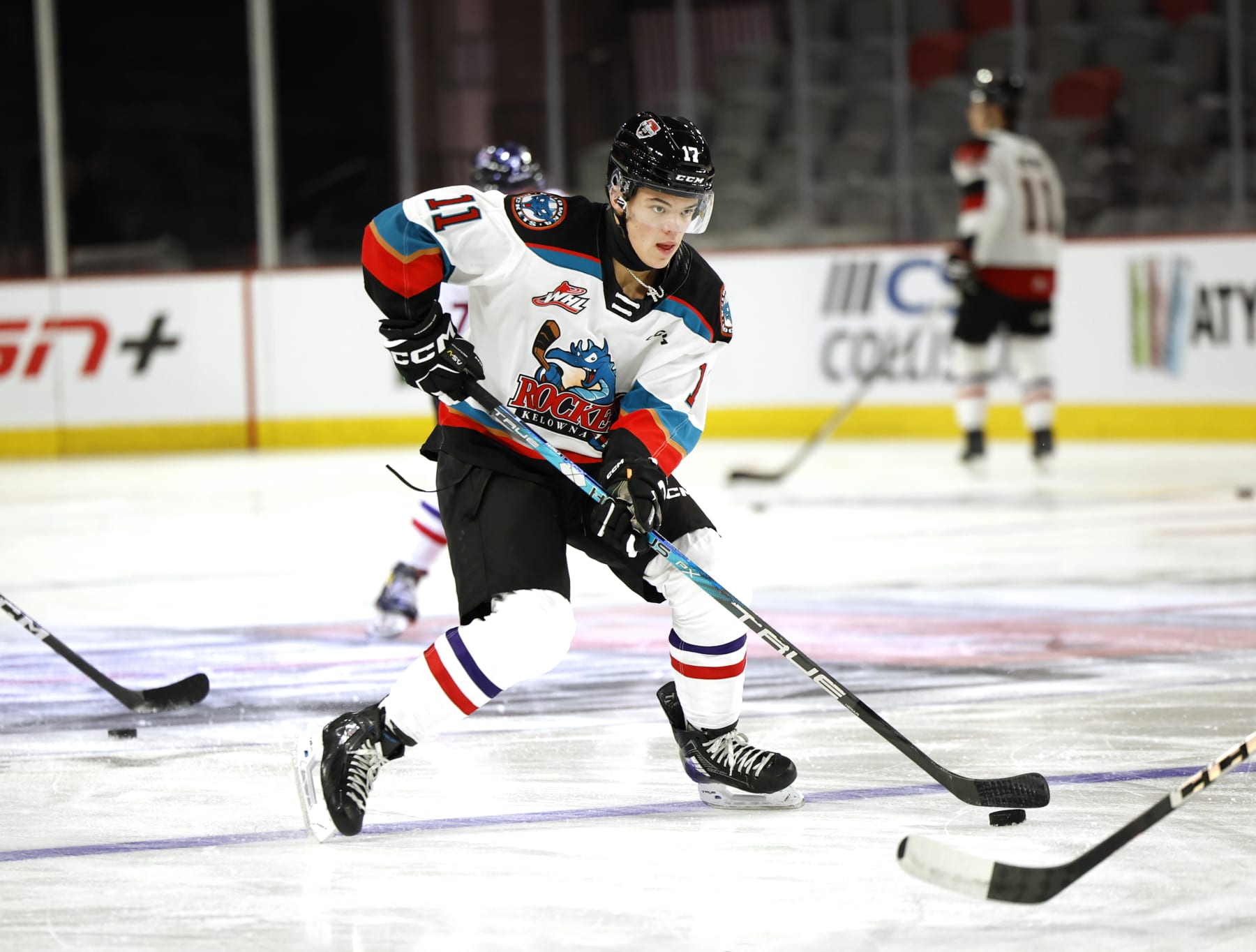 MONCTON, CANADA - JANUARY 23:   Tij Iginla #17 of Team White stick handle the puck during practice session of 2024 Kabota Top Prospects game at Avenir Centre on January 23, 2024 in Moncton, Canada. (Photo by Dale Preston/Getty Images)