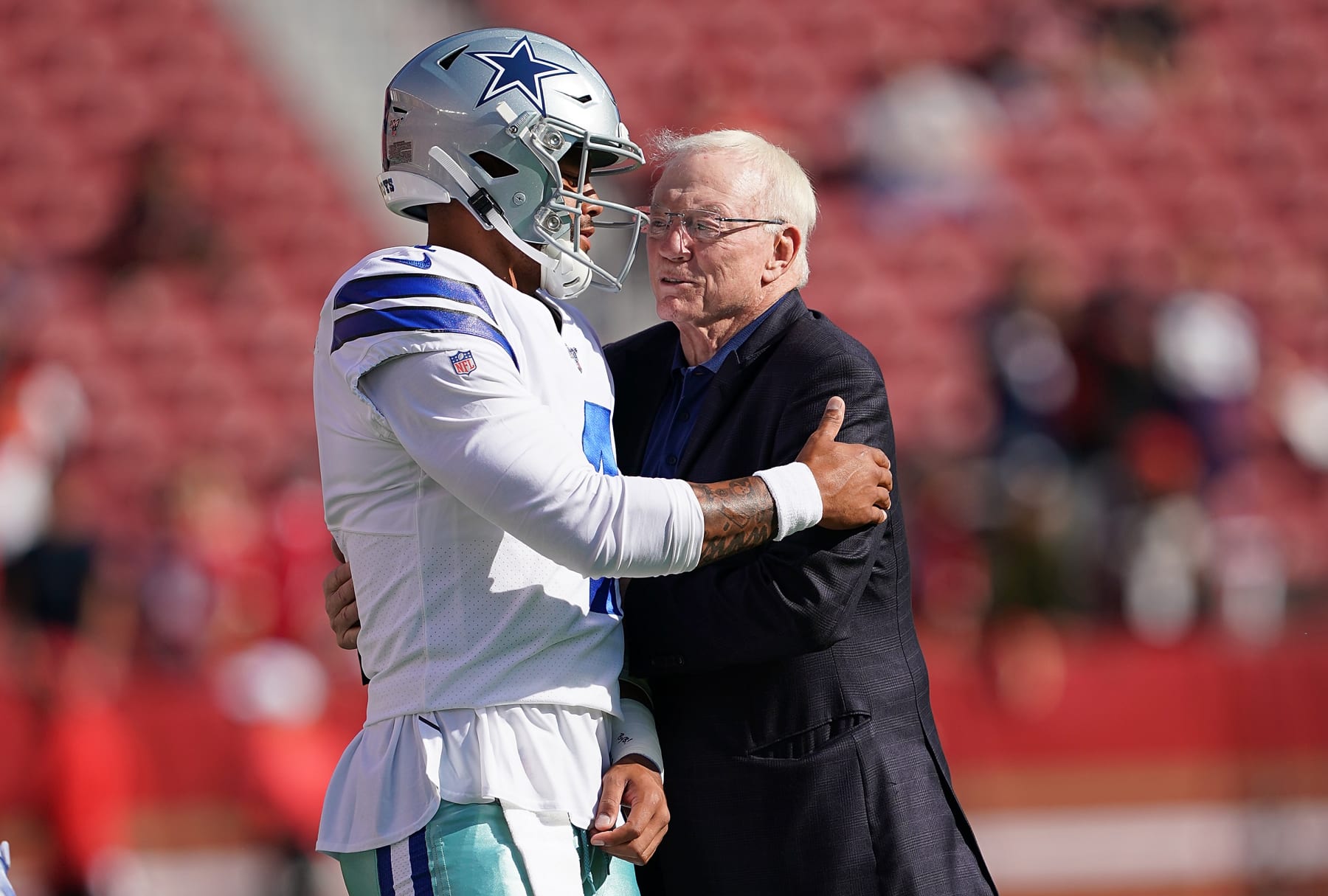 Dallas Cowboys quarterback Dak Prescott and team owner Jerry Jones.