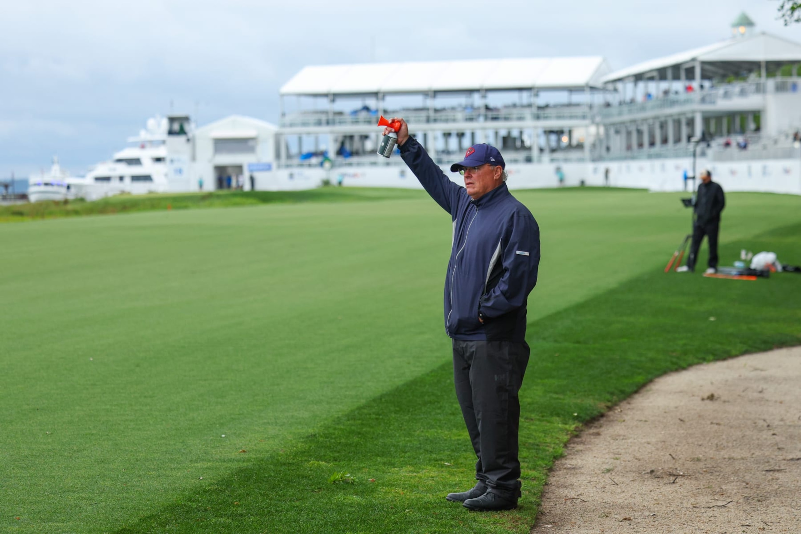HILTON HEAD ISLAND, SOUTH CAROLINA - APRIL 21: A rules official blows an air horn to resume play during the final round of the RBC Heritage at Harbour Town Golf Links on April 21, 2024 in Hilton Head Island, South Carolina. (Photo by Andrew Redington/Getty Images) HILTON HEAD ISLAND, SOUTH CAROLINA - APRIL 21: A rules official blows an air horn to resume play during the final round of the RBC Heritage at Harbour Town Golf Links on April 21, 2024 in Hilton Head Island, South Carolina. (Photo by Andrew Redington/Getty Images)