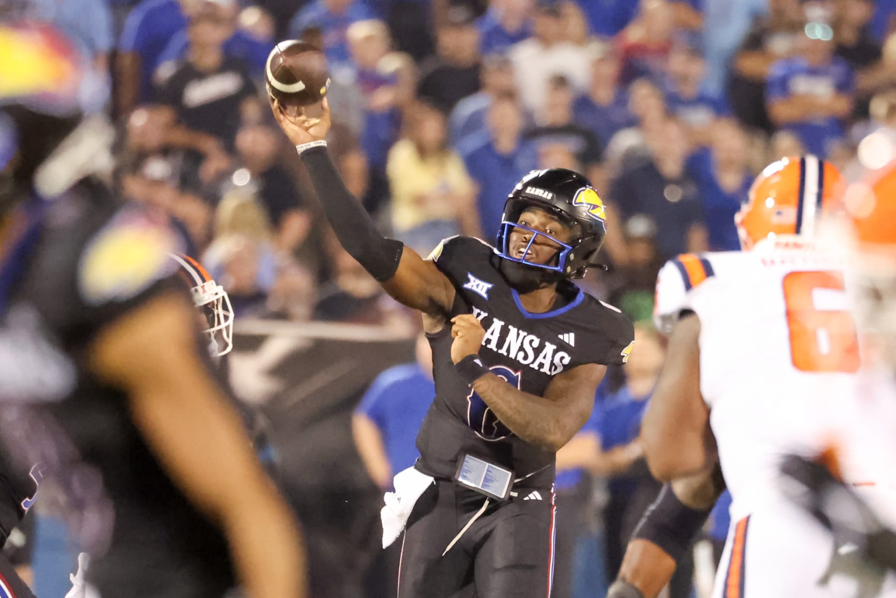 LAWRENCE, KS - SEPTEMBER 08: Kansas Jayhawks quarterback Jalon Daniels (6) throws from the pocket in the third quarter of a college football game between the Illinois Fighting Illini and Kansas Jayhawks on Sep 8, 2023 at David Booth memorial Stadium in Lawrence, KS. (Photo by Scott Winters/Icon Sportswire via Getty Images)