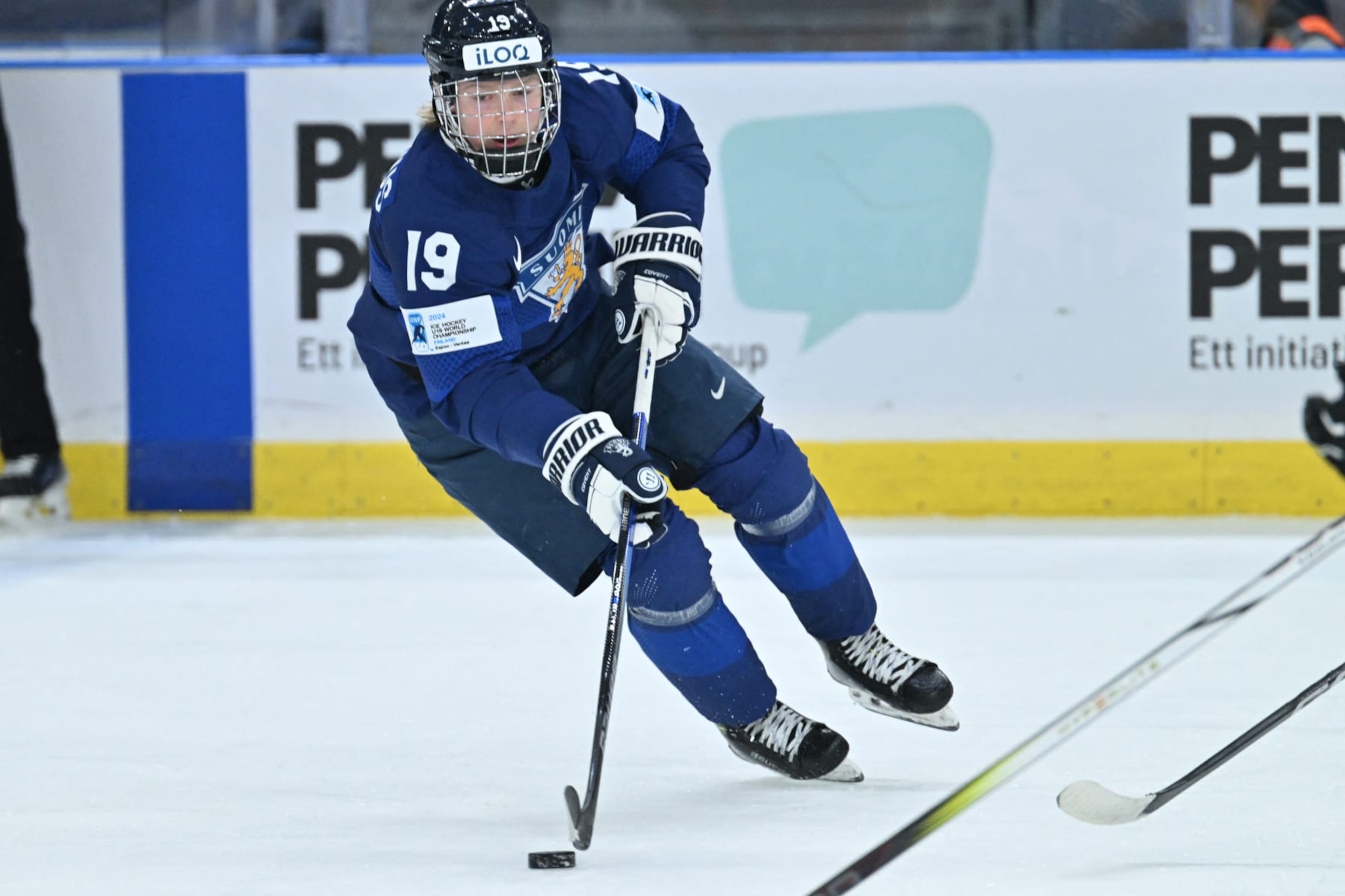 Finland's #19 Konsta Helenius controls the puck during the Group A ice hockey match between Finland and Germany of the IIHF World Junior Championship in Gothenburg, Sweden on December 27, 2023. (Photo by Bjorn LARSSON ROSVALL / TT News Agency / AFP) / Sweden OUT (Photo by BJORN LARSSON ROSVALL/TT News Agency/AFP via Getty Images)