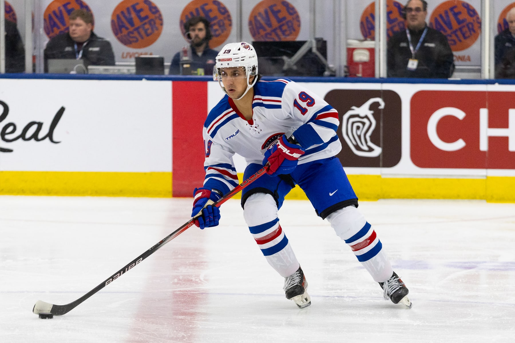PLYMOUTH, MI - JANUARY 15: Michael Hage #19 of Team White skates with the puck during Chipotle All-American Game between Team Blue and Team White at USA Hockey Arena on January 15, 2024 in Plymouth, Michigan. (Photo by Michael Miller/ISI Photos/Getty Images)