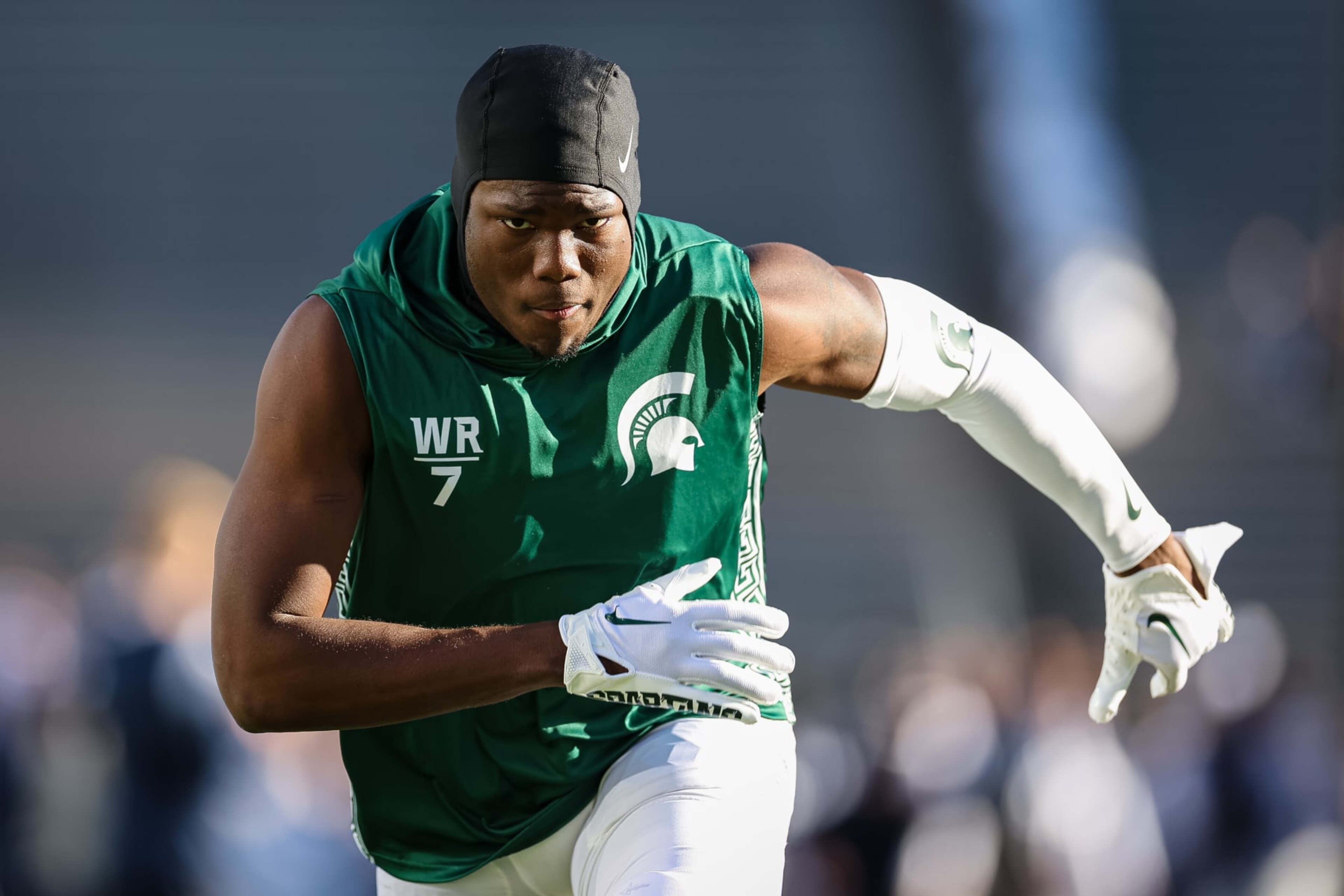 STATE COLLEGE, PA - NOVEMBER 26: Antonio Gates Jr. #7 of the Michigan State Spartans warms up before the game against the Penn State Nittany Lions at Beaver Stadium on November 26, 2022 in State College, Pennsylvania. (Photo by Scott Taetsch/Getty Images) STATE COLLEGE, PA - NOVEMBER 26: Antonio Gates Jr. #7 of the Michigan State Spartans warms up before the game against the Penn State Nittany Lions at Beaver Stadium on November 26, 2022 in State College, Pennsylvania. (Photo by Scott Taetsch/Getty Images)