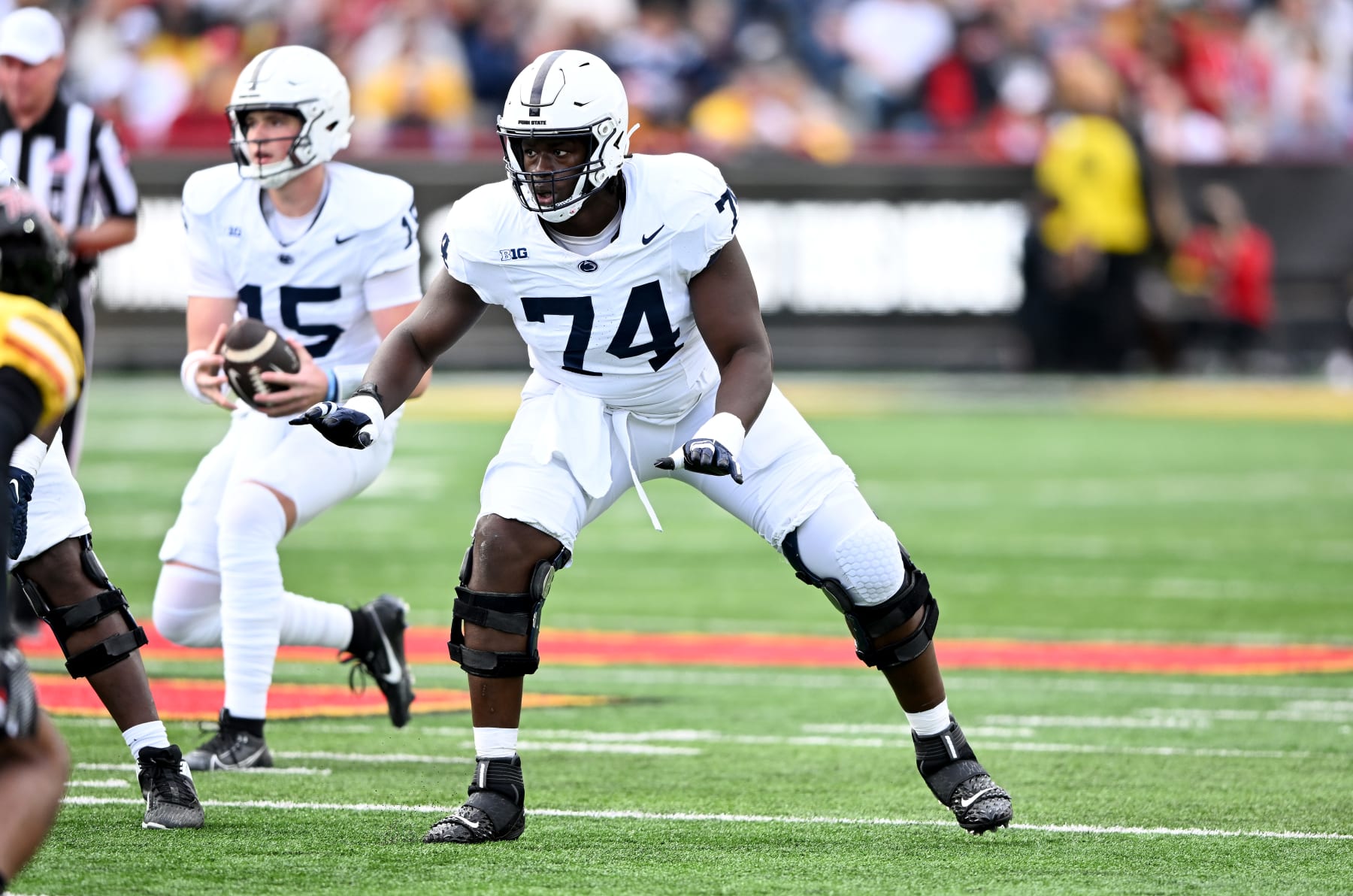 COLLEGE PARK, MARYLAND - NOVEMBER 04: Olumuyiwa Fashanu #74 of the Penn State Nittany Lions blocks against the Maryland Terrapins at SECU Stadium on November 04, 2023 in College Park, Maryland. (Photo by G Fiume/Getty Images)