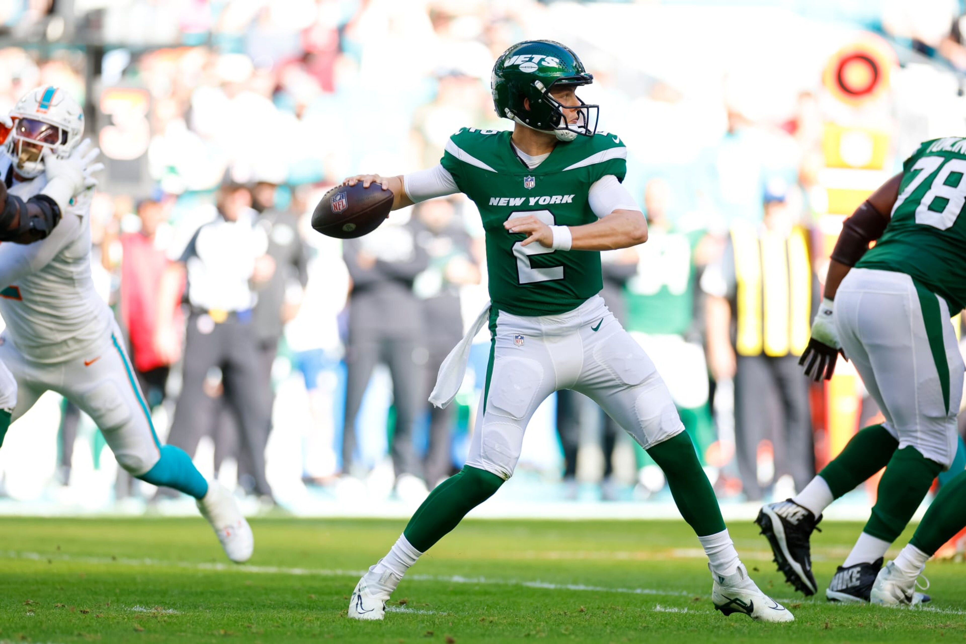 MIAMI GARDENS, FLORIDA - DECEMBER 17: Zach Wilson #2 of the New York Jets passes the ball in the first half during a game against the Miami Dolphins at Hard Rock Stadium on December 17, 2023 in Miami Gardens, Florida. (Photo by Brandon Sloter/Image Of Sport/Getty Images) MIAMI GARDENS, FLORIDA - DECEMBER 17: Zach Wilson #2 of the New York Jets passes the ball in the first half during a game against the Miami Dolphins at Hard Rock Stadium on December 17, 2023 in Miami Gardens, Florida. (Photo by Brandon Sloter/Image Of Sport/Getty Images)