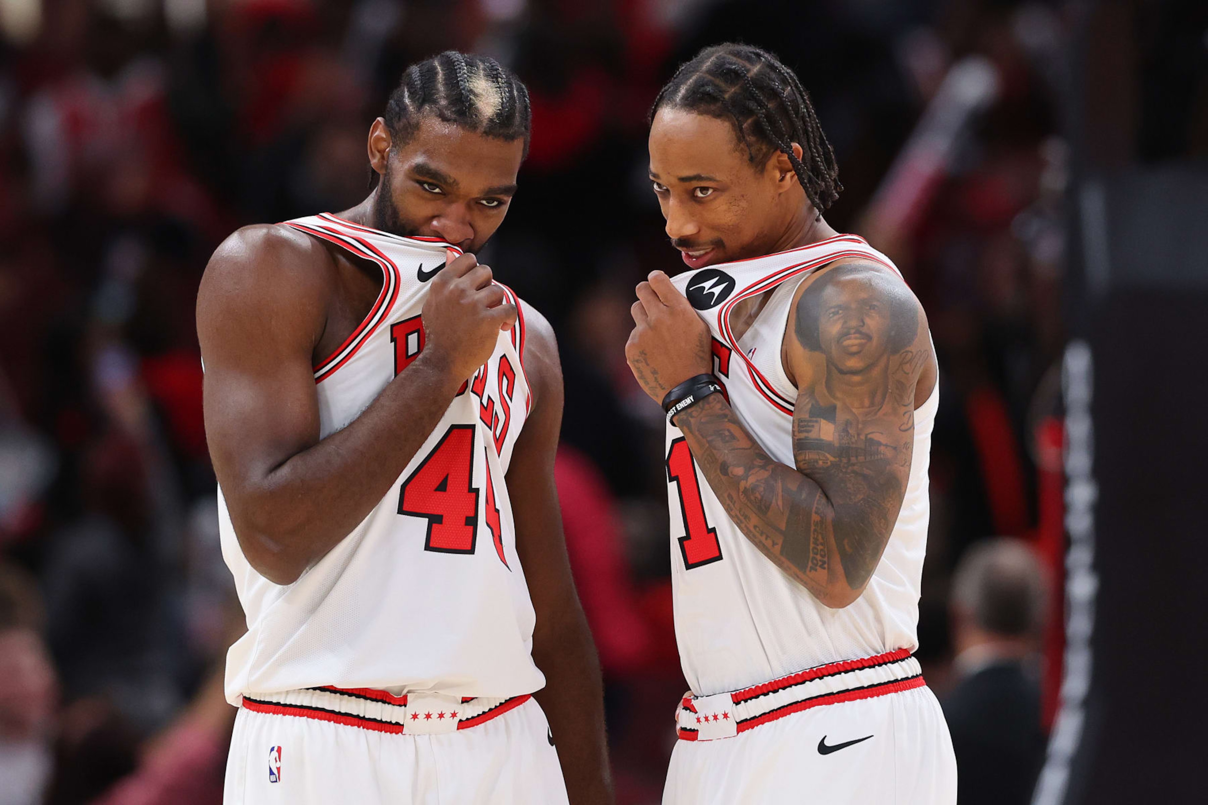 CHICAGO, ILLINOIS - NOVEMBER 06: Patrick Williams #44 and DeMar DeRozan #11 of the Chicago Bulls confer against the Utah Jazz during the first half at the United Center on November 06, 2023 in Chicago, Illinois. NOTE TO USER: User expressly acknowledges and agrees that, by downloading and or using this photograph, User is consenting to the terms and conditions of the Getty Images License Agreement. (Photo by Michael Reaves/Getty Images) CHICAGO, ILLINOIS - NOVEMBER 06: Patrick Williams #44 and DeMar DeRozan #11 of the Chicago Bulls confer against the Utah Jazz during the first half at the United Center on November 06, 2023 in Chicago, Illinois. NOTE TO USER: User expressly acknowledges and agrees that, by downloading and or using this photograph, User is consenting to the terms and conditions of the Getty Images License Agreement. (Photo by Michael Reaves/Getty Images)