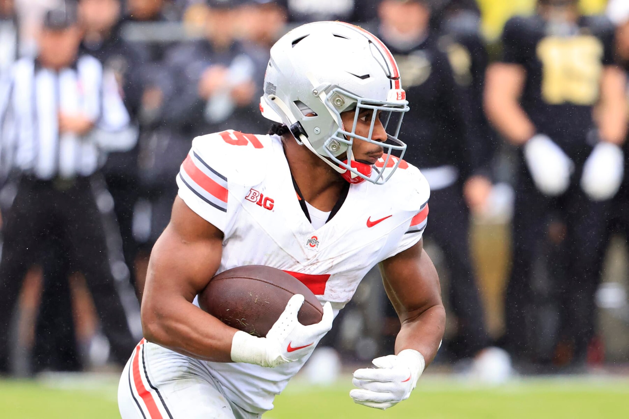 WEST LAFAYETTE, INDIANA - OCTOBER 14: Dallan Hayden #5 of the Ohio State Buckeyes runs the ball in the game against the Purdue Boilermakers at Ross-Ade Stadium on October 14, 2023 in West Lafayette, Indiana. (Photo by Justin Casterline/Getty Images)