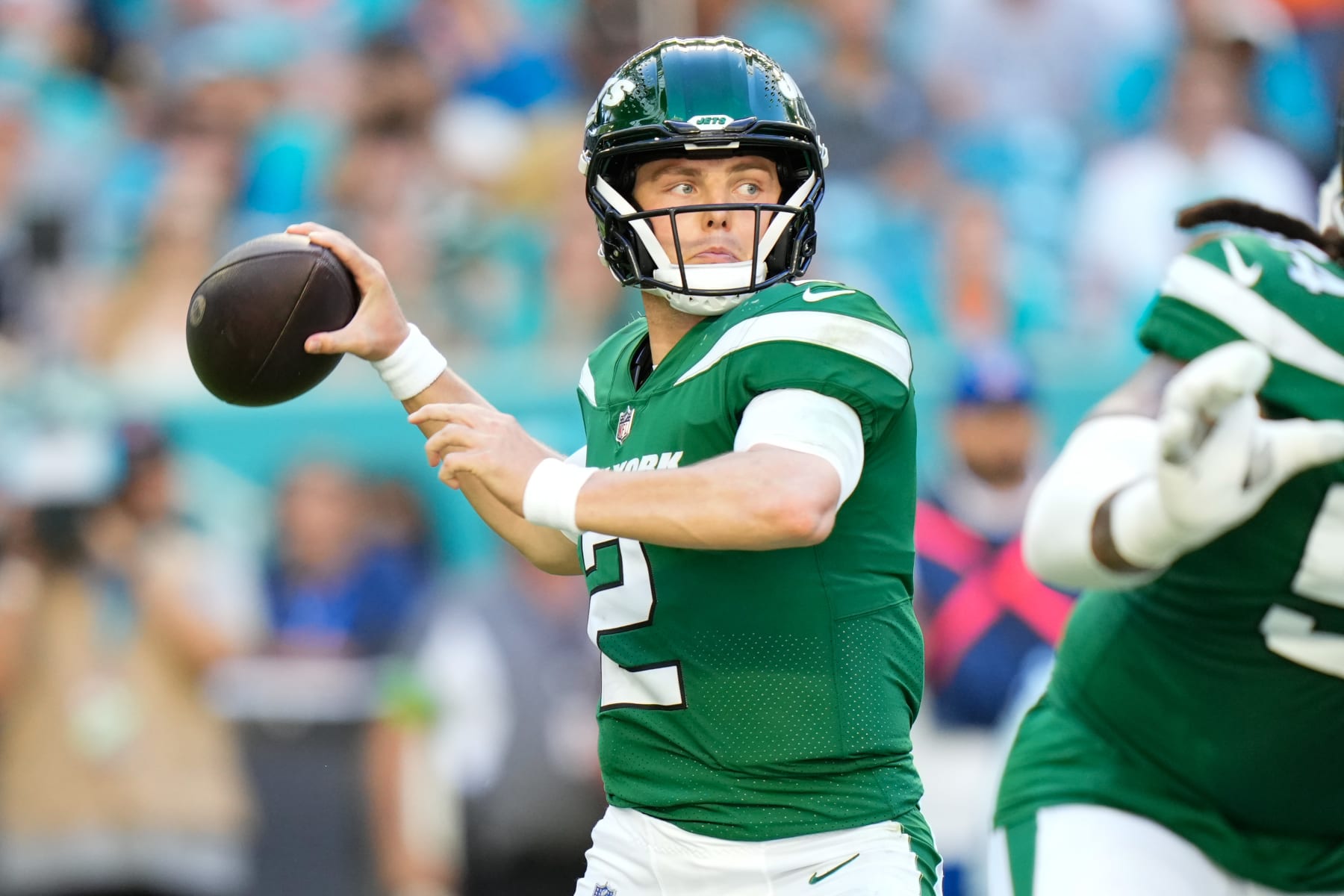 MIAMI GARDENS, FLORIDA - DECEMBER 17: Zach Wilson #2 of the New York Jets throws a pass during the first half against the Miami Dolphins at Hard Rock Stadium on December 17, 2023 in Miami Gardens, Florida. (Photo by Rich Storry/Getty Images)
