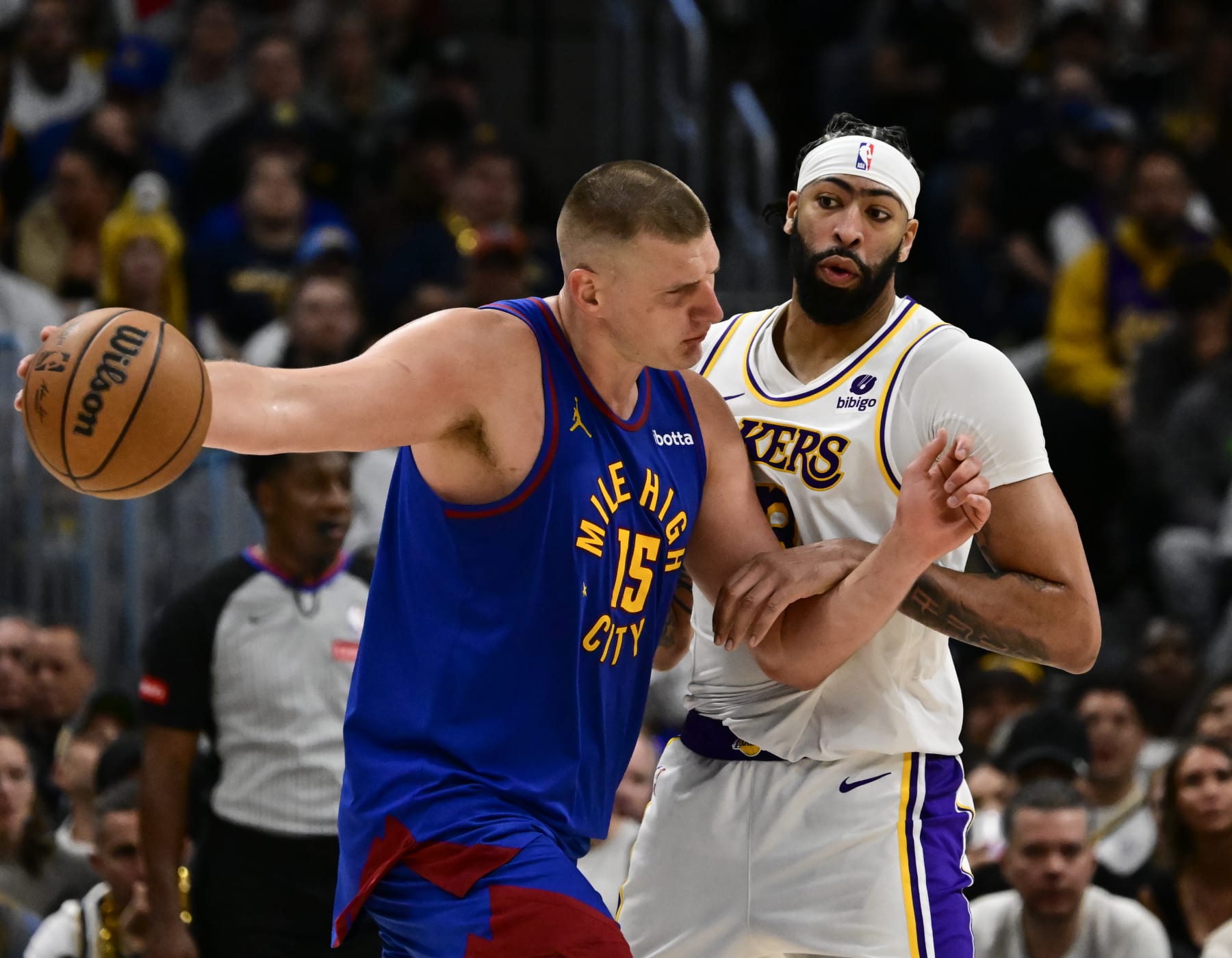 DENVER, CO - APRIL 20: Denver Nuggets center Nikola Jokic (15) heads up court against Los Angeles Lakers forward Anthony Davis (3) in the fourth quarter during the first round of the NBA playoffs at Ball Arena in Denver, Colorado on Saturday, April 20, 2024. (Photo by Andy Cross/MediaNews Group/The Denver Post via Getty Images)
