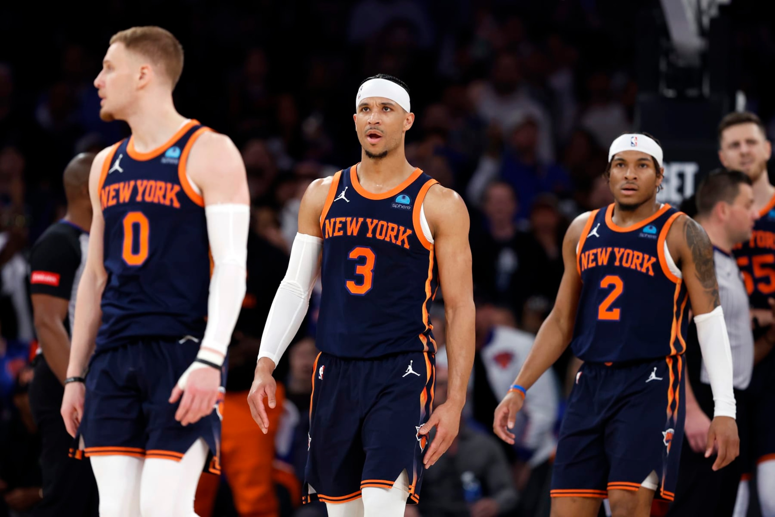 NEW YORK, NEW YORK - APRIL 22: Donte DiVincenzo #0, Josh Hart #3, and Miles McBride #2 of the New York Knicks look on during the first half against the Philadelphia 76ers in Game Two of the Eastern Conference First Round Playoffs at Madison Square Garden on April 22, 2024 in New York City. NOTE TO USER: User expressly acknowledges and agrees that, by downloading and or using this photograph, User is consenting to the terms and conditions of the Getty Images License Agreement. (Photo by Sarah Stier/Getty Images) NEW YORK, NEW YORK - APRIL 22: Donte DiVincenzo #0, Josh Hart #3, and Miles McBride #2 of the New York Knicks look on during the first half against the Philadelphia 76ers in Game Two of the Eastern Conference First Round Playoffs at Madison Square Garden on April 22, 2024 in New York City. NOTE TO USER: User expressly acknowledges and agrees that, by downloading and or using this photograph, User is consenting to the terms and conditions of the Getty Images License Agreement. (Photo by Sarah Stier/Getty Images)