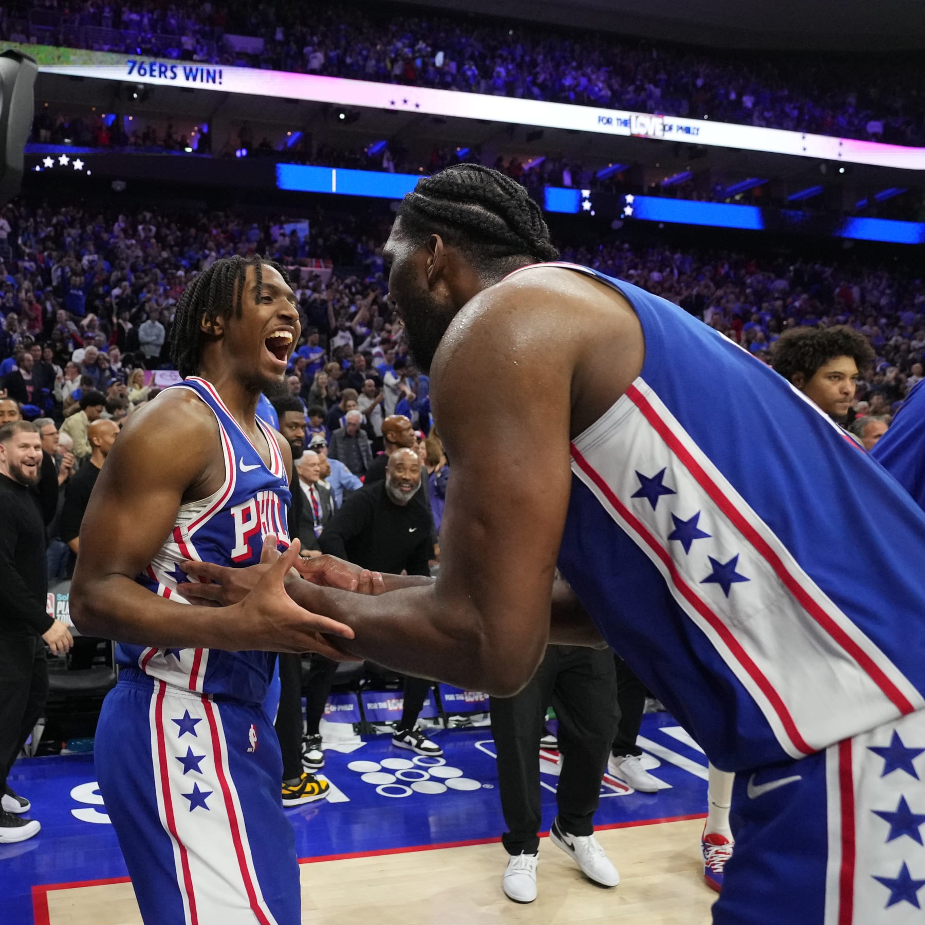 PHILADELPHIA, PA - APRIL 17: Tyrese Maxey #0 and Joel Embiid #21 of the Philadelphia 76ers celebrate after the game against the Miami Heat during the 2024 NBA Play-In Tournament on April 17, 2024 at the Wells Fargo Center in Philadelphia, Pennsylvania NOTE TO USER: User expressly acknowledges and agrees that, by downloading and/or using this Photograph, user is consenting to the terms and conditions of the Getty Images License Agreement. Mandatory Copyright Notice: Copyright 2024 NBAE (Photo by Jesse D. Garrabrant/NBAE via Getty Images)