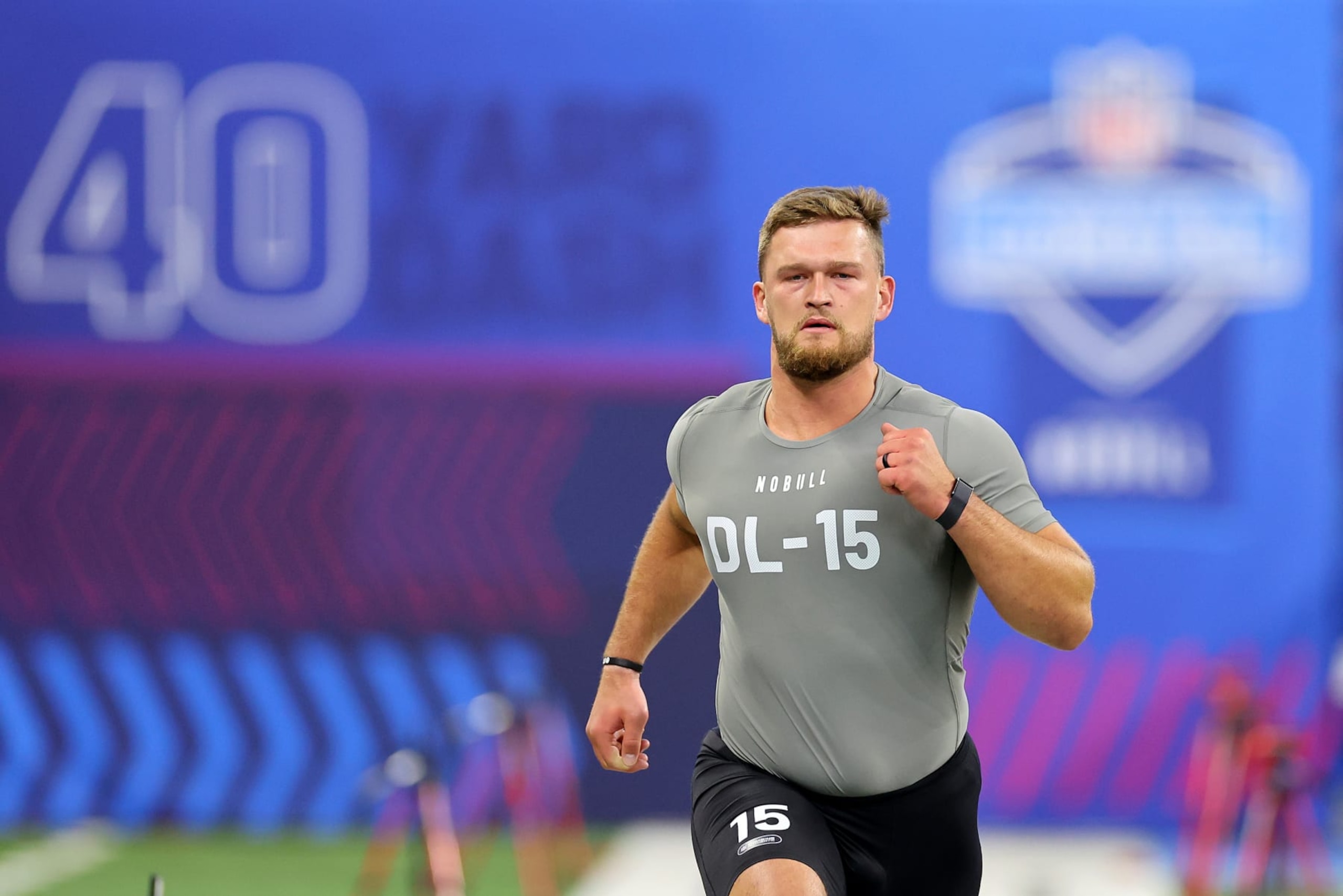 INDIANAPOLIS, INDIANA - FEBRUARY 29: Logan Lee #DL15 of Iowa participates in the 40-yard dash during the NFL Combine at Lucas Oil Stadium on February 29, 2024 in Indianapolis, Indiana. (Photo by Stacy Revere/Getty Images)