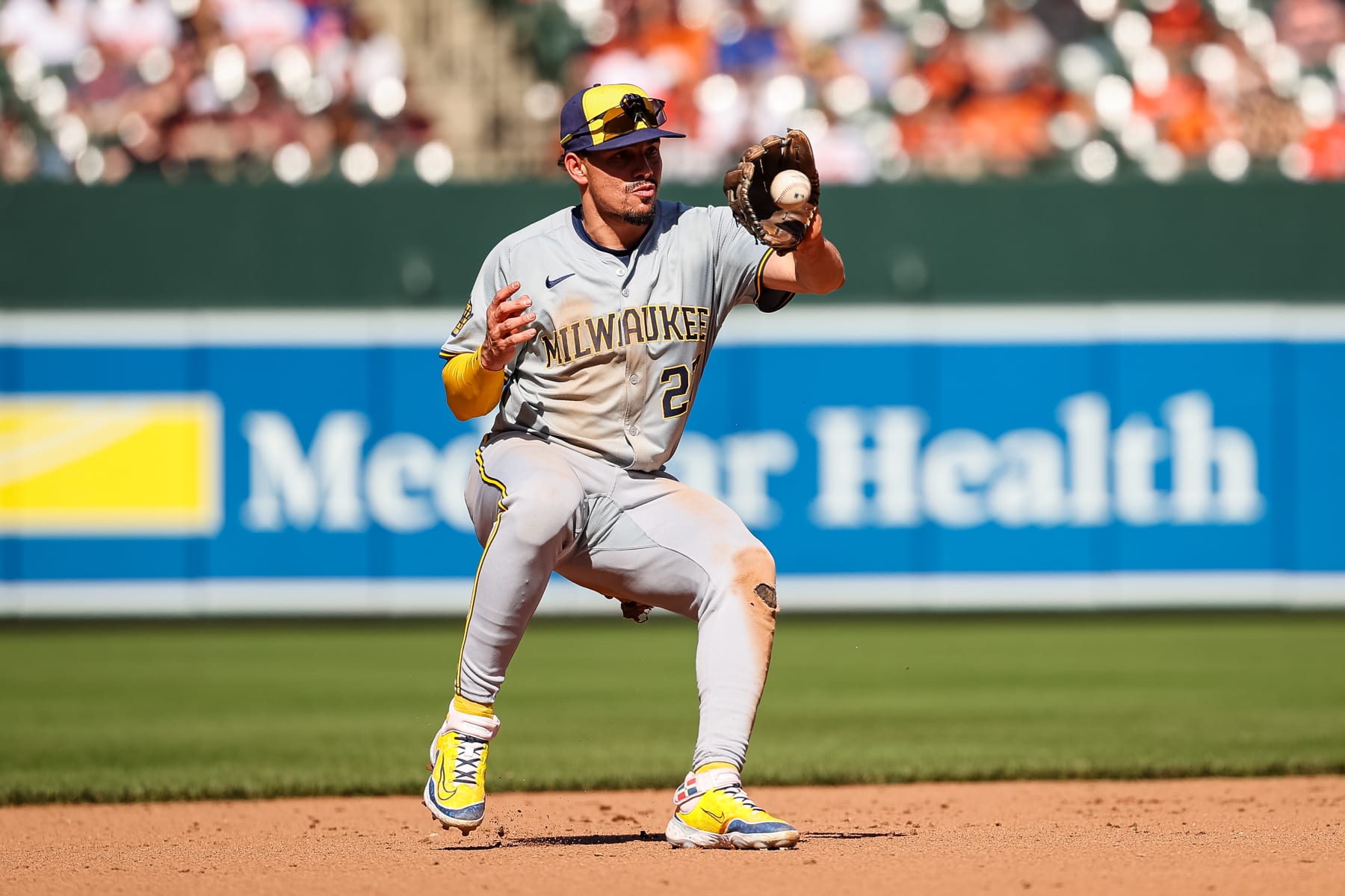 BALTIMORE, MD - APRIL 14: Willy Adames #27 of the Milwaukee Brewers fields a ground ball during the eighth inning against the Baltimore Orioles at Oriole Park at Camden Yards on April 14, 2024 in Baltimore, Maryland. (Photo by Scott Taetsch/Getty Images)