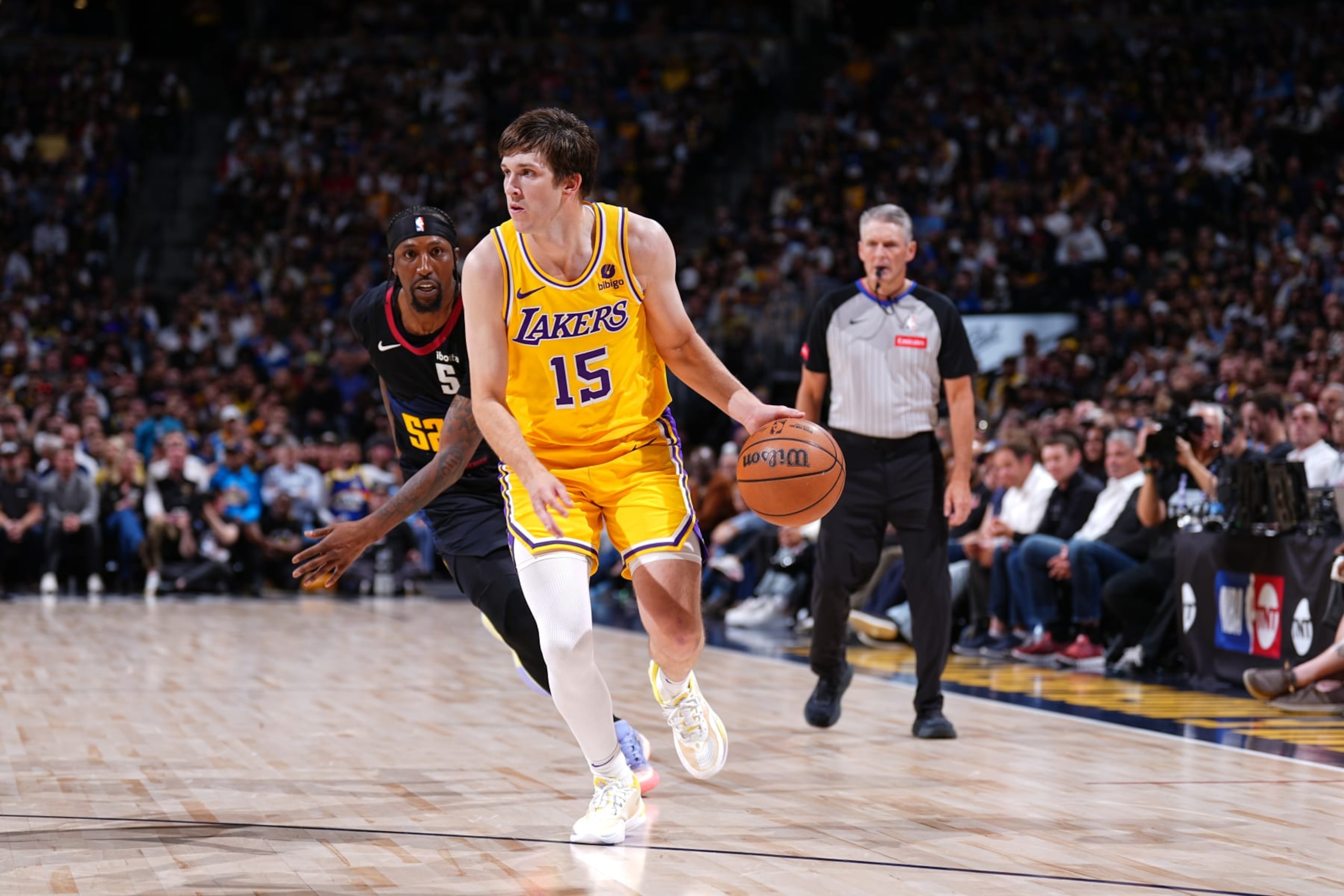 DENVER, CO - APRRIL 22: Austin Reaves #15 of the Los Angeles Lakers drives to the basket during the game against the Denver Nuggets during Round 1 Game 2 of the 2024 NBA Playoffs on April 22, 2024 at the Ball Arena in Denver, Colorado. NOTE TO USER: User expressly acknowledges and agrees that, by downloading and/or using this Photograph, user is consenting to the terms and conditions of the Getty Images License Agreement. Mandatory Copyright Notice: Copyright 2024 NBAE (Photo by Garrett Ellwood/NBAE via Getty Images) DENVER, CO - APRRIL 22: Austin Reaves #15 of the Los Angeles Lakers drives to the basket during the game against the Denver Nuggets during Round 1 Game 2 of the 2024 NBA Playoffs on April 22, 2024 at the Ball Arena in Denver, Colorado. NOTE TO USER: User expressly acknowledges and agrees that, by downloading and/or using this Photograph, user is consenting to the terms and conditions of the Getty Images License Agreement. Mandatory Copyright Notice: Copyright 2024 NBAE (Photo by Garrett Ellwood/NBAE via Getty Images)