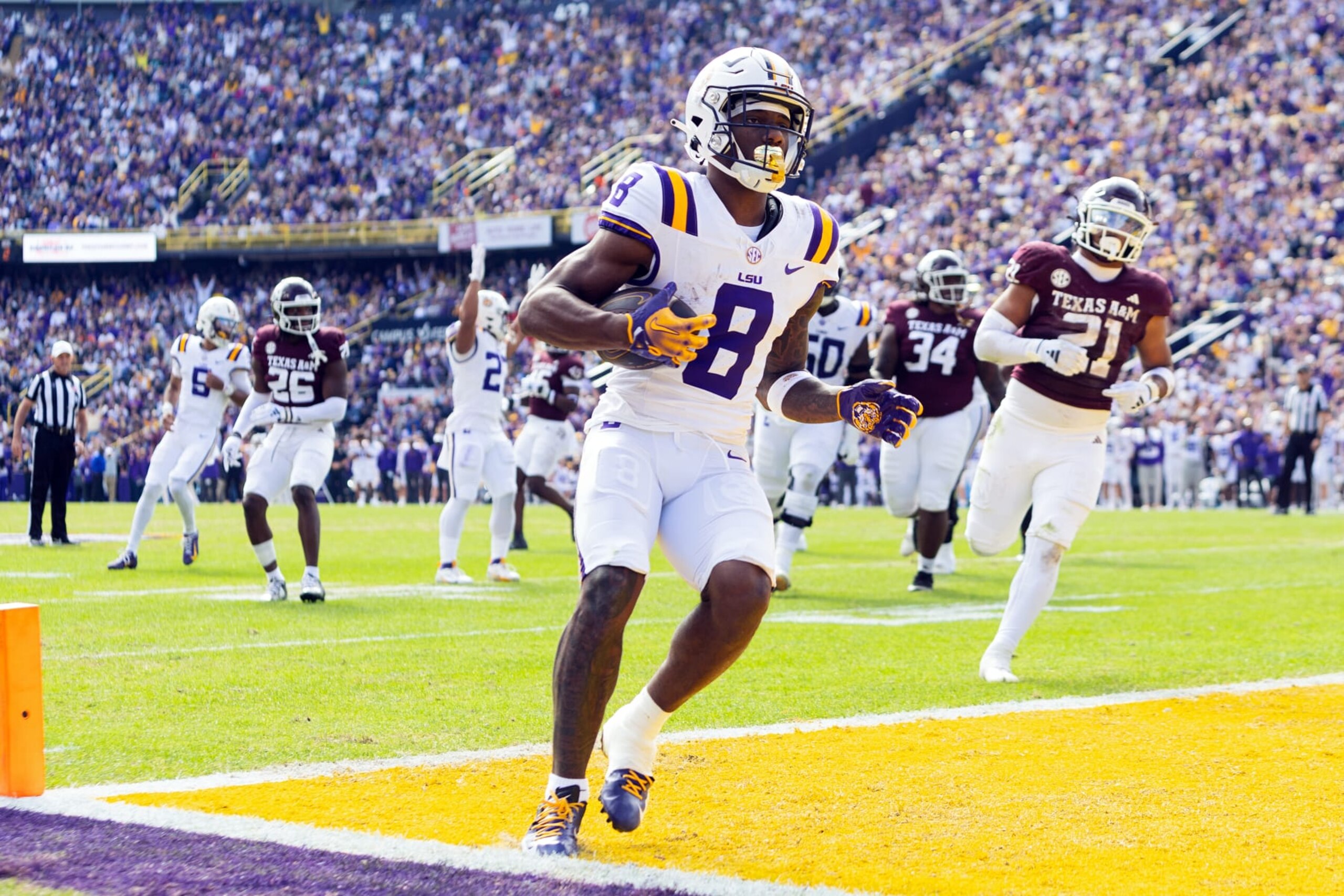 BATON ROUGE, LA - NOVEMBER 25: LSU Tigers wide receiver Malik Nabers (8) catches a pass during a game between the Texas A&M Aggies and the LSU Tigers in Tiger Stadium in Baton Rouge, Louisiana on November 25, 2023.(Photo by John Korduner/Icon Sportswire via Getty Images) BATON ROUGE, LA - NOVEMBER 25: LSU Tigers wide receiver Malik Nabers (8) catches a pass during a game between the Texas A&M Aggies and the LSU Tigers in Tiger Stadium in Baton Rouge, Louisiana on November 25, 2023.(Photo by John Korduner/Icon Sportswire via Getty Images)