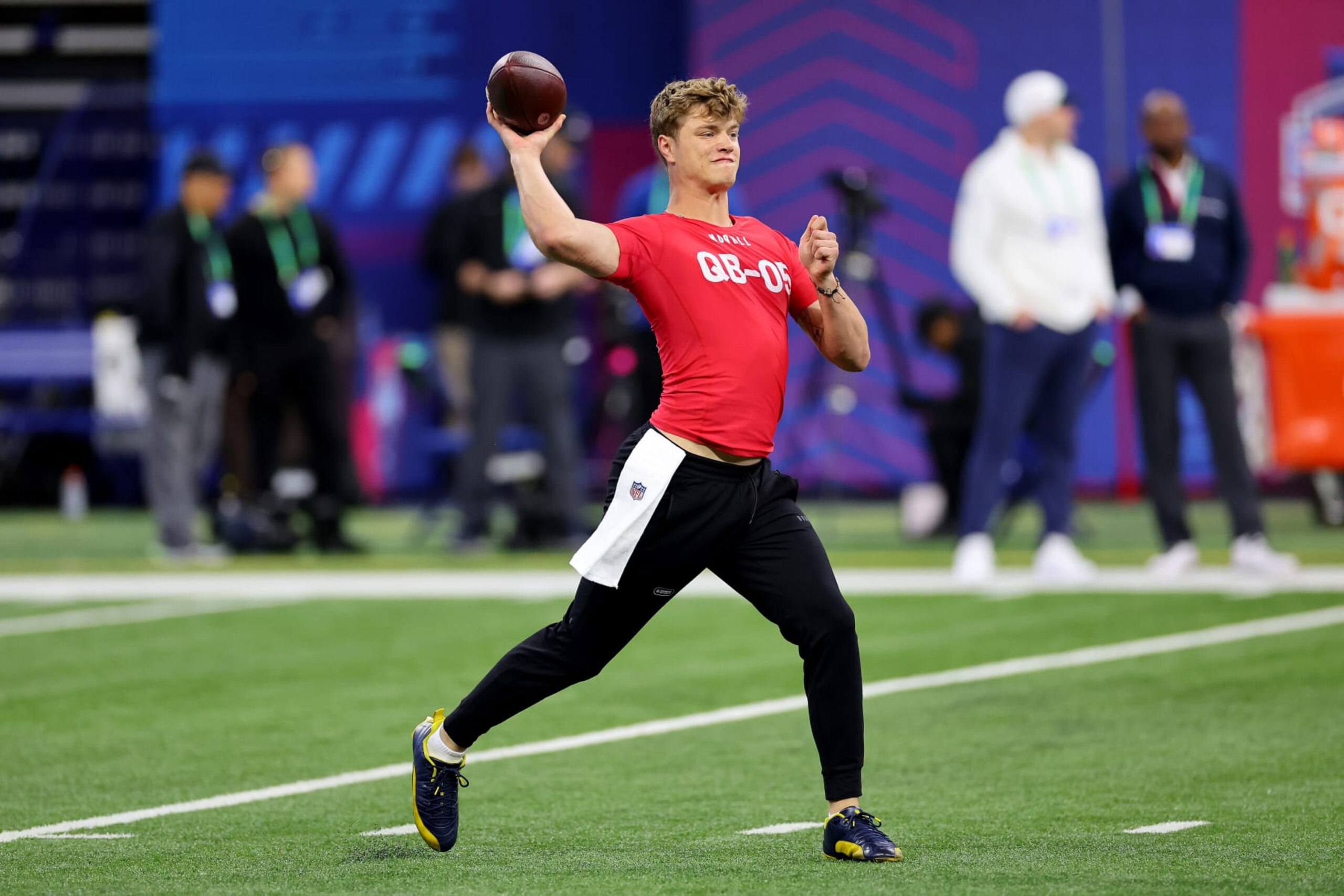 INDIANAPOLIS, INDIANA - MARCH 02: J J McCarthy #QB05 of Michigan participates in a drill during the NFL Combine at Lucas Oil Stadium on March 02, 2024 in Indianapolis, Indiana. (Photo by Stacy Revere/Getty Images)