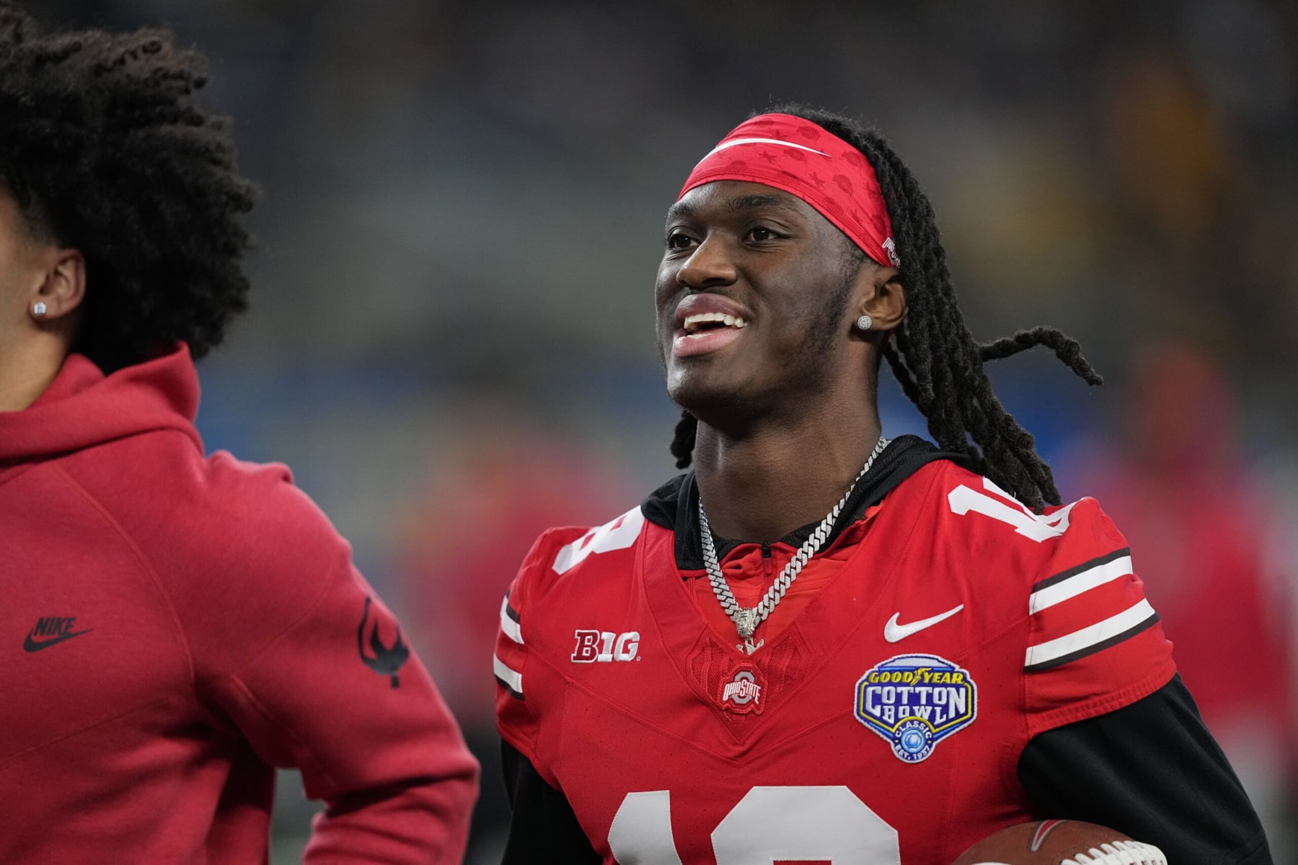 ARLINGTON, TEXAS - DECEMBER 29: Marvin Harrison Jr. #18 of the Ohio State Buckeyes reacts prior to a game against the Missouri Tigers during the Goodyear Cotton Bowl at AT&T Stadium on December 29, 2023 in Arlington, Texas. (Photo by Sam Hodde/Getty Images) ARLINGTON, TEXAS - DECEMBER 29: Marvin Harrison Jr. #18 of the Ohio State Buckeyes reacts prior to a game against the Missouri Tigers during the Goodyear Cotton Bowl at AT&T Stadium on December 29, 2023 in Arlington, Texas. (Photo by Sam Hodde/Getty Images)