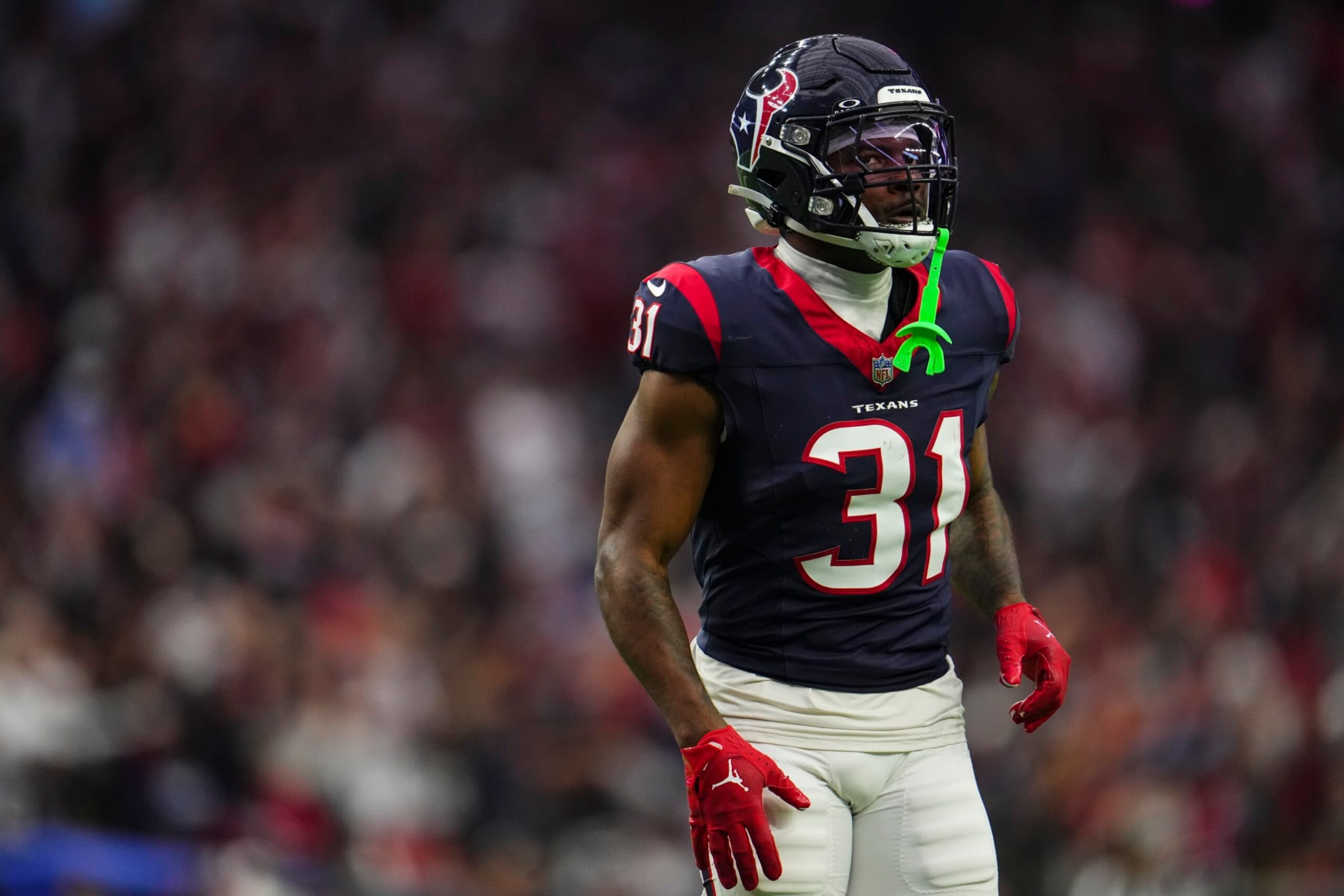 HOUSTON, TX - JANUARY 13: Dameon Pierce #31 of the Houston Texans looks on from the field during an NFL wild-card playoff football game against the Cleveland Browns at NRG Stadium on January 13, 2024 in Houston, Texas. (Photo by Cooper Neill/Getty Images) HOUSTON, TX - JANUARY 13: Dameon Pierce #31 of the Houston Texans looks on from the field during an NFL wild-card playoff football game against the Cleveland Browns at NRG Stadium on January 13, 2024 in Houston, Texas. (Photo by Cooper Neill/Getty Images)