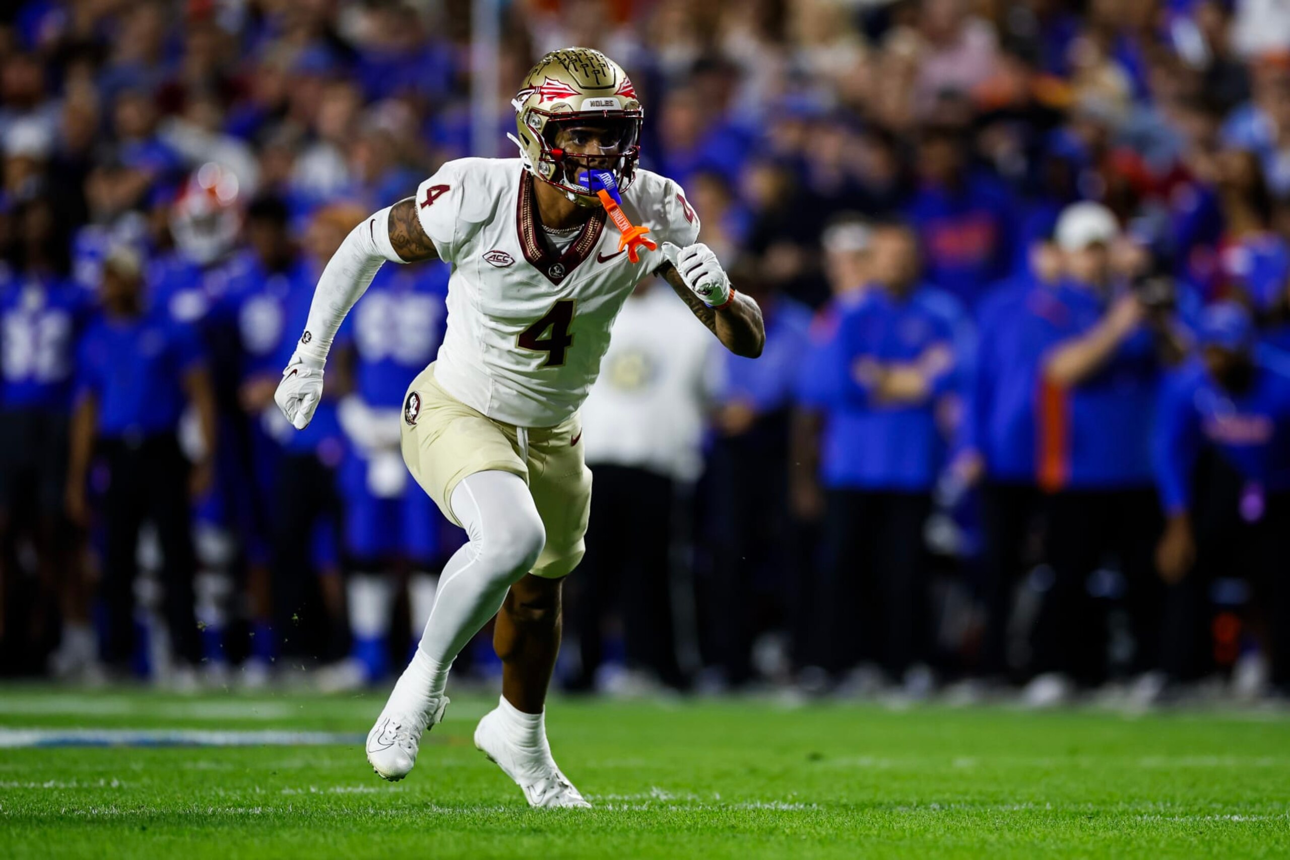 GAINESVILLE, FLORIDA - NOVEMBER 25: Keon Coleman #4 of the Florida State Seminoles runs during the second half of a game against the Florida Gators at Ben Hill Griffin Stadium on November 25, 2023 in Gainesville, Florida. (Photo by James Gilbert/Getty Images) GAINESVILLE, FLORIDA - NOVEMBER 25: Keon Coleman #4 of the Florida State Seminoles runs during the second half of a game against the Florida Gators at Ben Hill Griffin Stadium on November 25, 2023 in Gainesville, Florida. (Photo by James Gilbert/Getty Images)