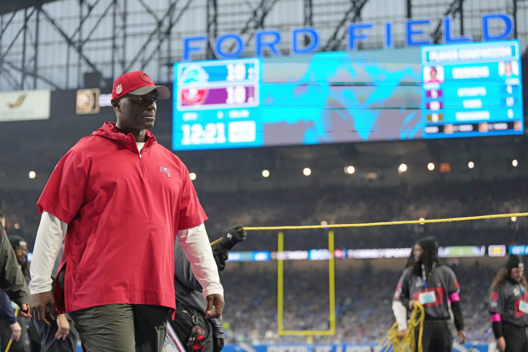 DETROIT, MICHIGAN - JANUARY 21: Head coach Todd Bowles of the Tampa Bay Buccaneers leaves the field for halftime during the NFC Divisional Playoff game against the Detroit Lions at Ford Field on January 21, 2024 in Detroit, Michigan. (Photo by Nic Antaya/Getty Images)