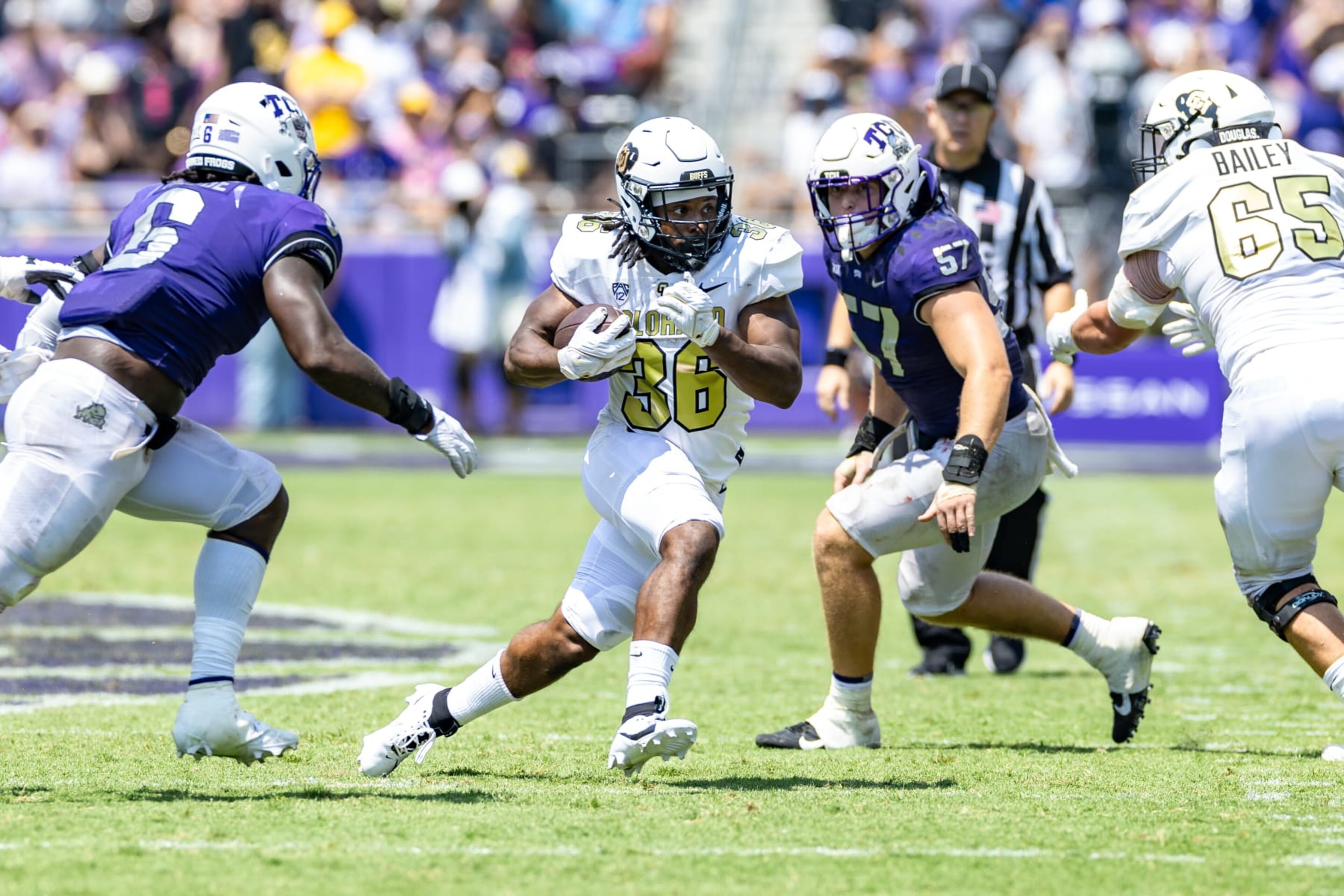 FORT WORTH, TX - SEPTEMBER 02: Colorado Buffaloes running back Sy'veon Wilkerson (#36) runs up field during the college football game between the Colorado Buffaloes and TCU Horned Frogs on September 2, 2023 at Amon G. Carter Stadium in Fort Worth, TX. (Photo by Matthew Visinsky/Icon Sportswire via Getty Images) FORT WORTH, TX - SEPTEMBER 02: Colorado Buffaloes running back Sy'veon Wilkerson (#36) runs up field during the college football game between the Colorado Buffaloes and TCU Horned Frogs on September 2, 2023 at Amon G. Carter Stadium in Fort Worth, TX. (Photo by Matthew Visinsky/Icon Sportswire via Getty Images)