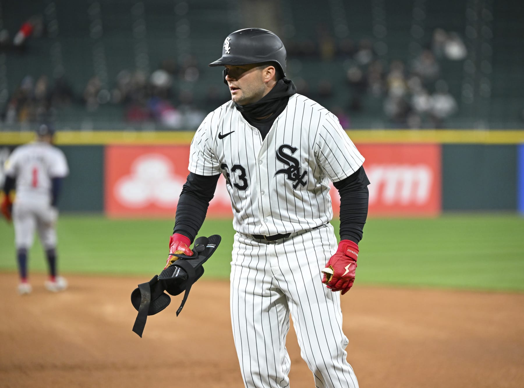 CHICAGO, ILLINOIS - APRIL 02: Andrew Benintendi #23 of the Chicago White Sox reacts after a single against the Atlanta Braves at Guaranteed Rate Field on April 02, 2024 in Chicago, Illinois. (Photo by Nuccio DiNuzzo/Getty Images)