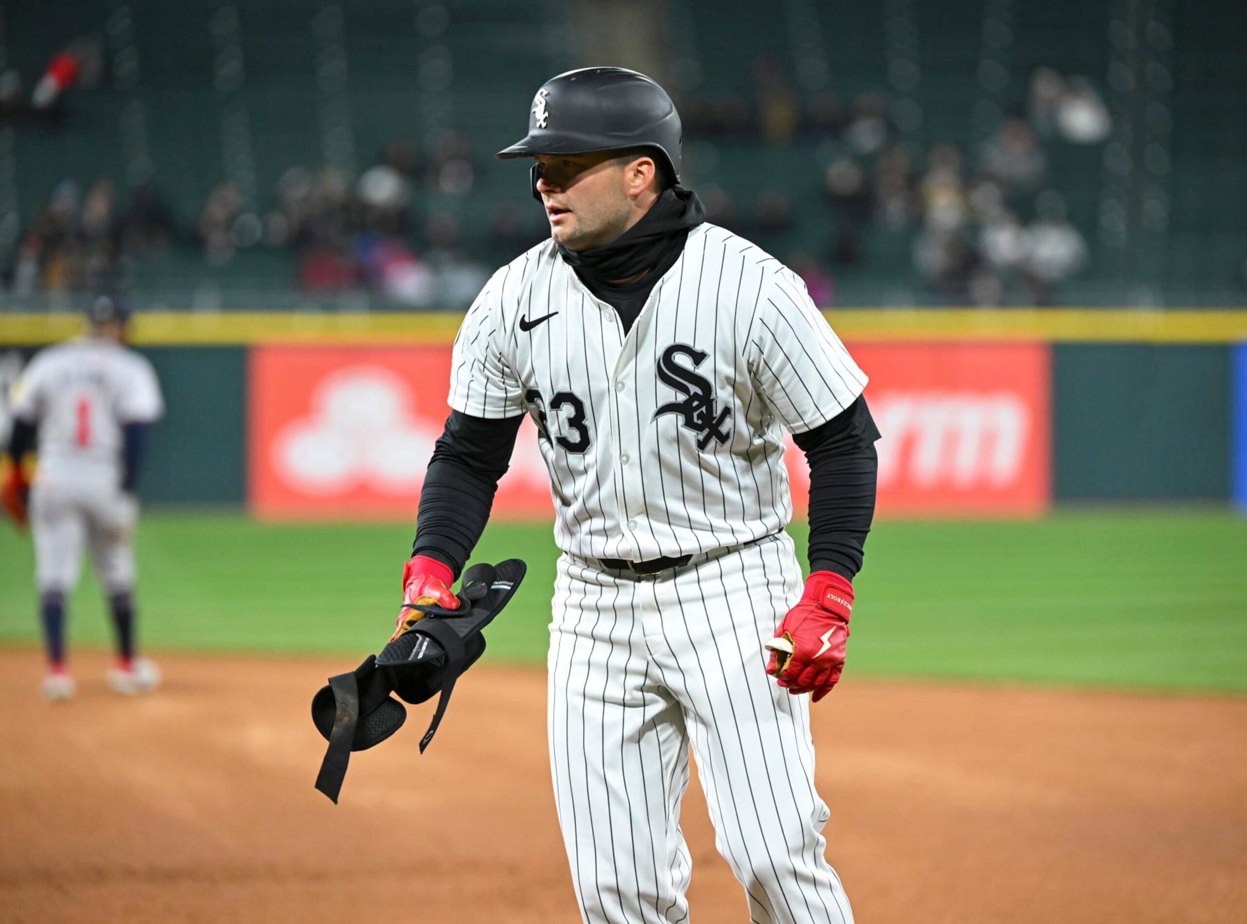 CHICAGO, ILLINOIS - APRIL 02: Andrew Benintendi #23 of the Chicago White Sox reacts after a single against the Atlanta Braves at Guaranteed Rate Field on April 02, 2024 in Chicago, Illinois. (Photo by Nuccio DiNuzzo/Getty Images)