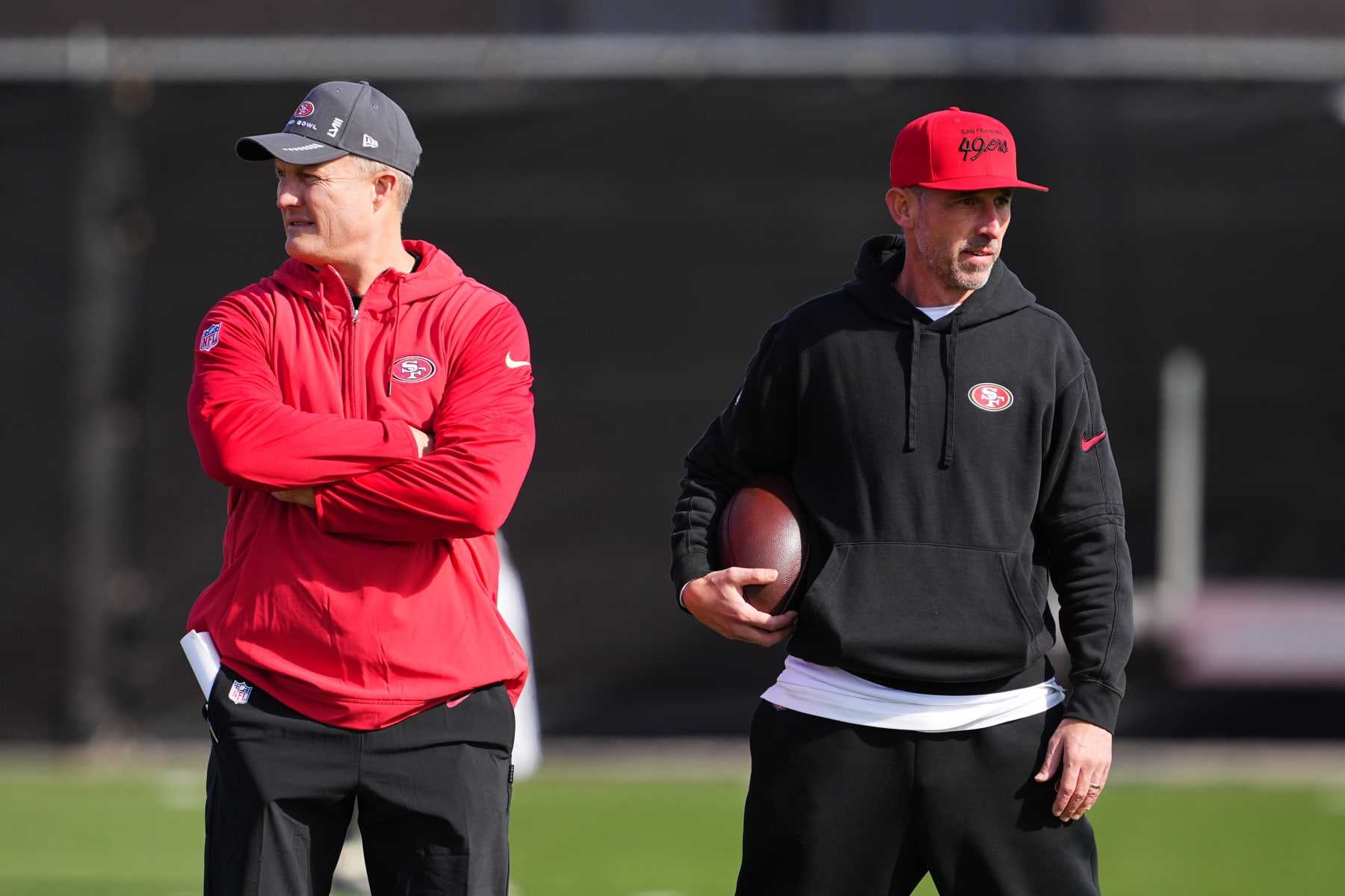LAS VEGAS, NEVADA - FEBRUARY 08: (L-R) General manager John Lynch and head coach Kyle Shanahan look on during San Francisco 49ers practice ahead of Super Bowl LVIII at Fertitta Football Complex on February 07, 2024 in Las Vegas, Nevada. (Photo by Chris Unger/Getty Images)