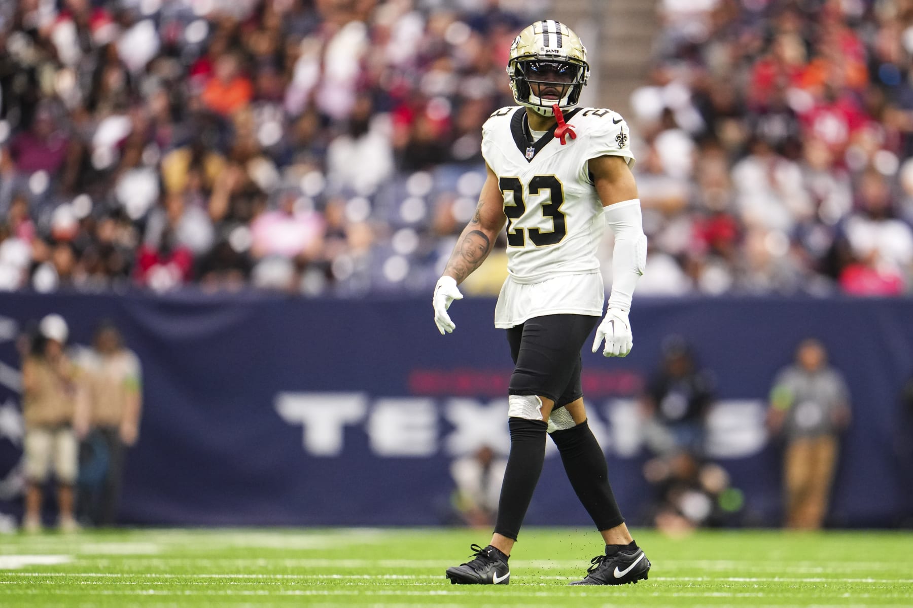 HOUSTON, TX - OCTOBER 15: Marshon Lattimore #23 of the New Orleans Saints looks on from the field during an NFL football game against the Houston Texans at NRG Stadium on October 15, 2023 in Houston, Texas. (Photo by Cooper Neill/Getty Images)