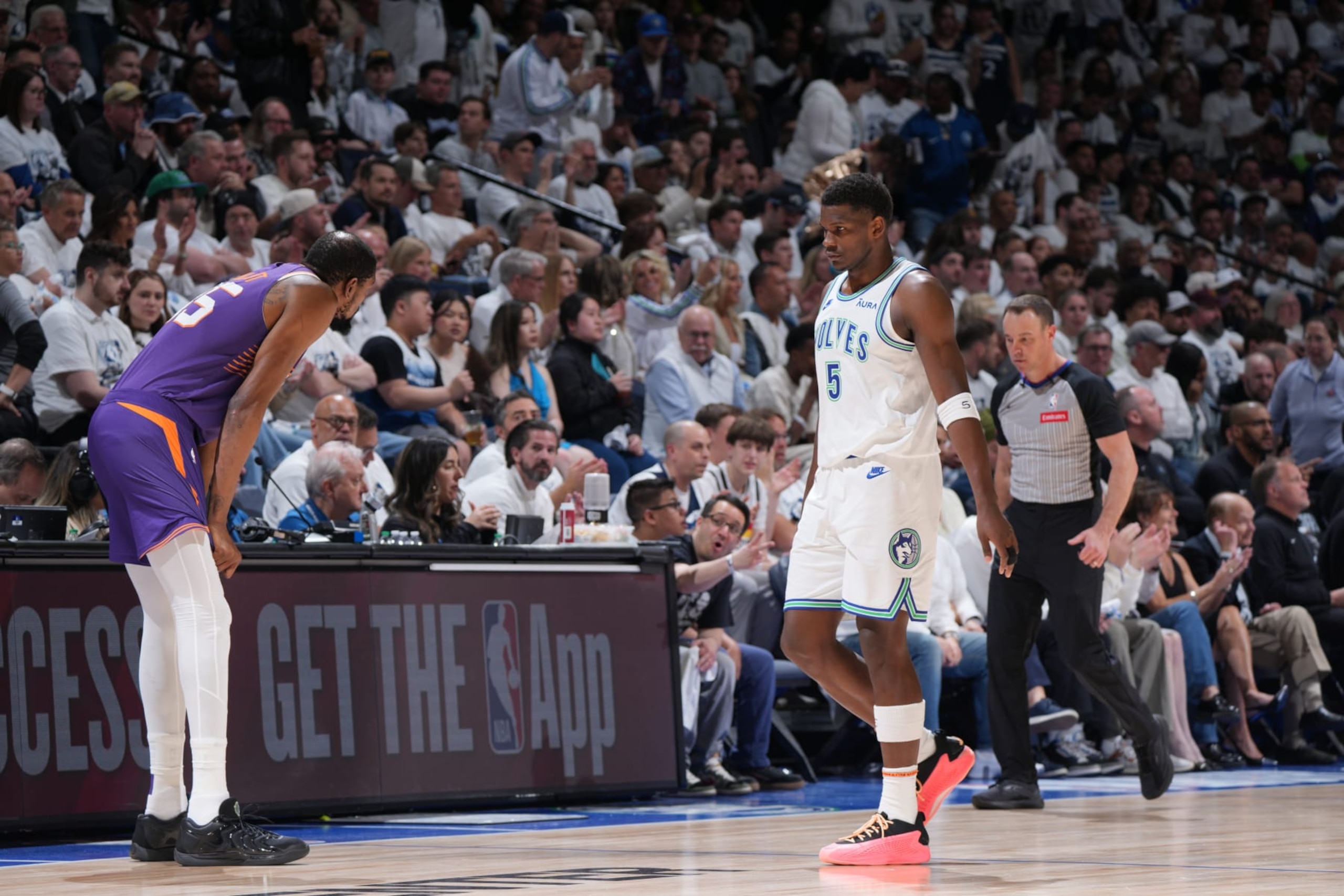 MINNEAPOLIS, MN -  APRIL 23: Anthony Edwards #5 of the Minnesota Timberwolves and Kevin Durant #35 of the Phoenix Suns look on during the game during Round One Game Two of the 2024 NBA Playoffs on April 23, 2024 at Target Center in Minneapolis, Minnesota. NOTE TO USER: User expressly acknowledges and agrees that, by downloading and or using this Photograph, user is consenting to the terms and conditions of the Getty Images License Agreement. Mandatory Copyright Notice: Copyright 2024 NBAE (Photo by Jordan Johnson/NBAE via Getty Images)
