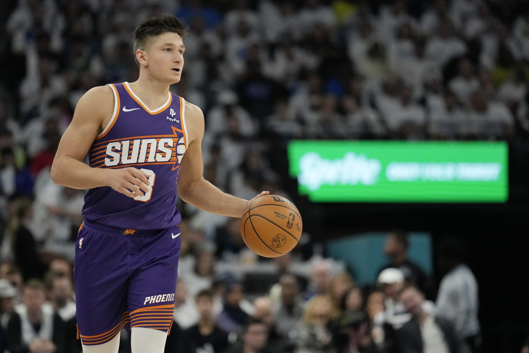 MINNEAPOLIS, MINNESOTA - APRIL 20: Grayson Allen #8 of the Phoenix Suns dribbles the ball during the second half in game one of the Western Conference First Round Playoffs against the Minnesota Timberwolves at Target Center on April 20, 2024 in Minneapolis, Minnesota. NOTE TO USER: User expressly acknowledges and agrees that, by downloading and or using this photograph, User is consenting to the terms and conditions of the Getty Images License Agreement. (Photo by Patrick McDermott/Getty Images)