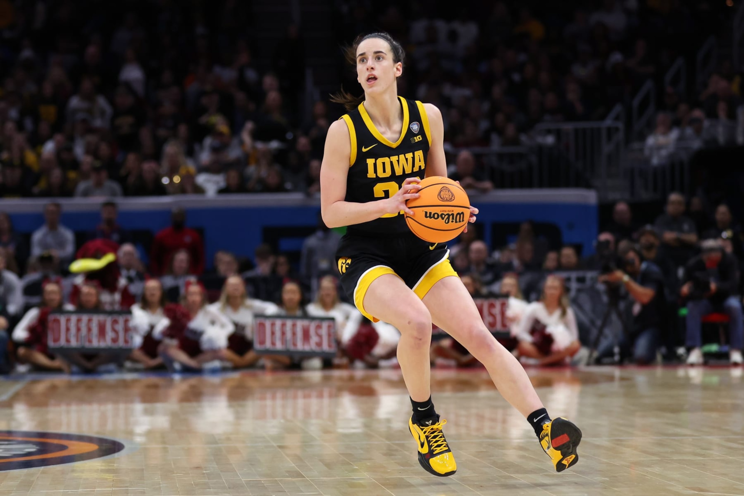 CLEVELAND, OHIO - APRIL 07: Caitlin Clark #22 of the Iowa Hawkeyes looks on in the second half during the 2024 NCAA Women's Basketball Tournament National Championship game against the South Carolina Gamecocks at Rocket Mortgage FieldHouse on April 07, 2024 in Cleveland, Ohio. (Photo by Steph Chambers/Getty Images) CLEVELAND, OHIO - APRIL 07: Caitlin Clark #22 of the Iowa Hawkeyes looks on in the second half during the 2024 NCAA Women's Basketball Tournament National Championship game against the South Carolina Gamecocks at Rocket Mortgage FieldHouse on April 07, 2024 in Cleveland, Ohio. (Photo by Steph Chambers/Getty Images)