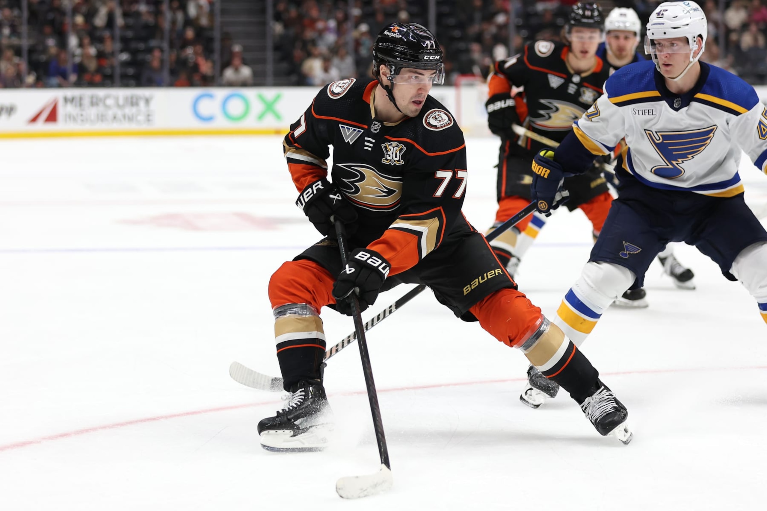 ANAHEIM, CALIFORNIA - APRIL 07: Frank Vatrano #77 of the Anaheim Ducks controls the puck during the third period of a game against the St. Louis Blues at Honda Center on April 07, 2024 in Anaheim, California. (Photo by Sean M. Haffey/Getty Images)