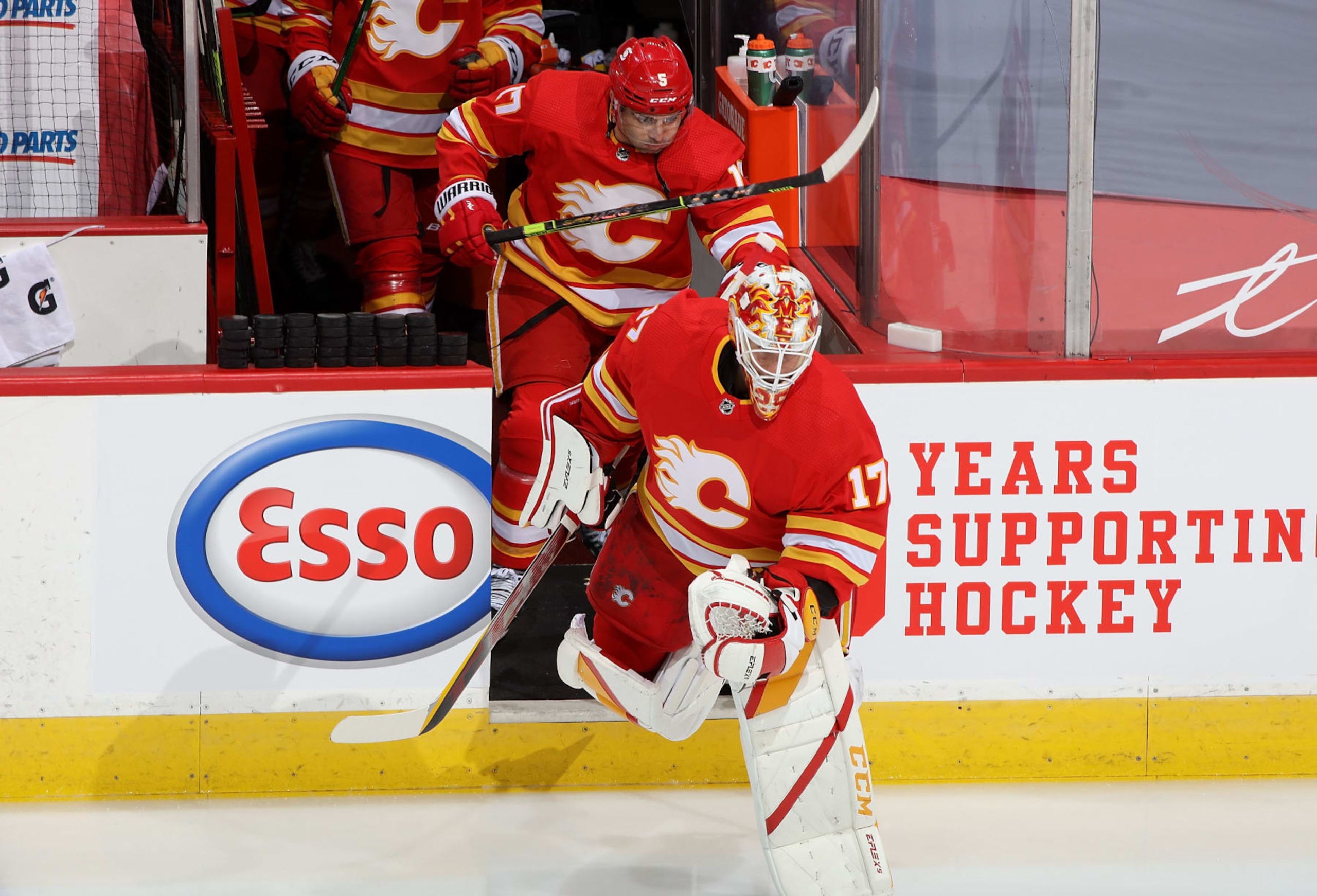 CALGARY, AB - APRIL 19: Jacob Markstrom #25 of the Calgary Flames leads the team out on to the ice for warmups wearing #17 in honour of teammate Milan Lucic reaching the 1000th career game mark last week prior to the game against the Ottawa Senators at Scotiabank Saddledome on April 19, 2021 in Calgary, Alberta, Canada. (Photo by Gerry Thomas/NHLI via Getty Images)