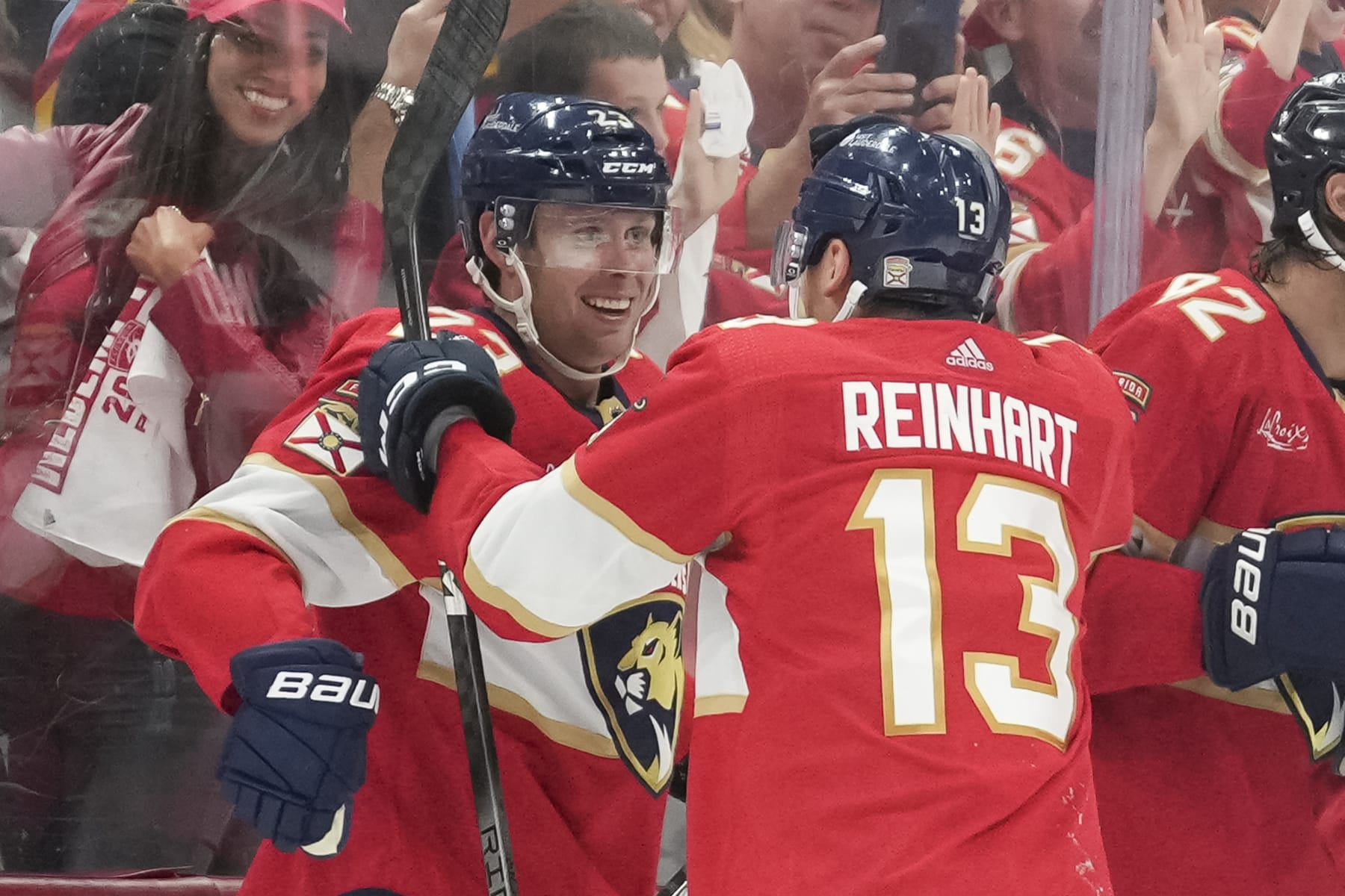 SUNRISE, FL - APRIL 23: Florida Panthers center Carter Verhaeghe (23) celebrates the overtime goal with teammates during game two of the Eastern Conference First Round between the Tampa Bay Lightning and the Florida Panthers at Amerant Bank Arena, Sunrise, Fla. (Photo by Peter Joneleit/Icon Sportswire via Getty Images)