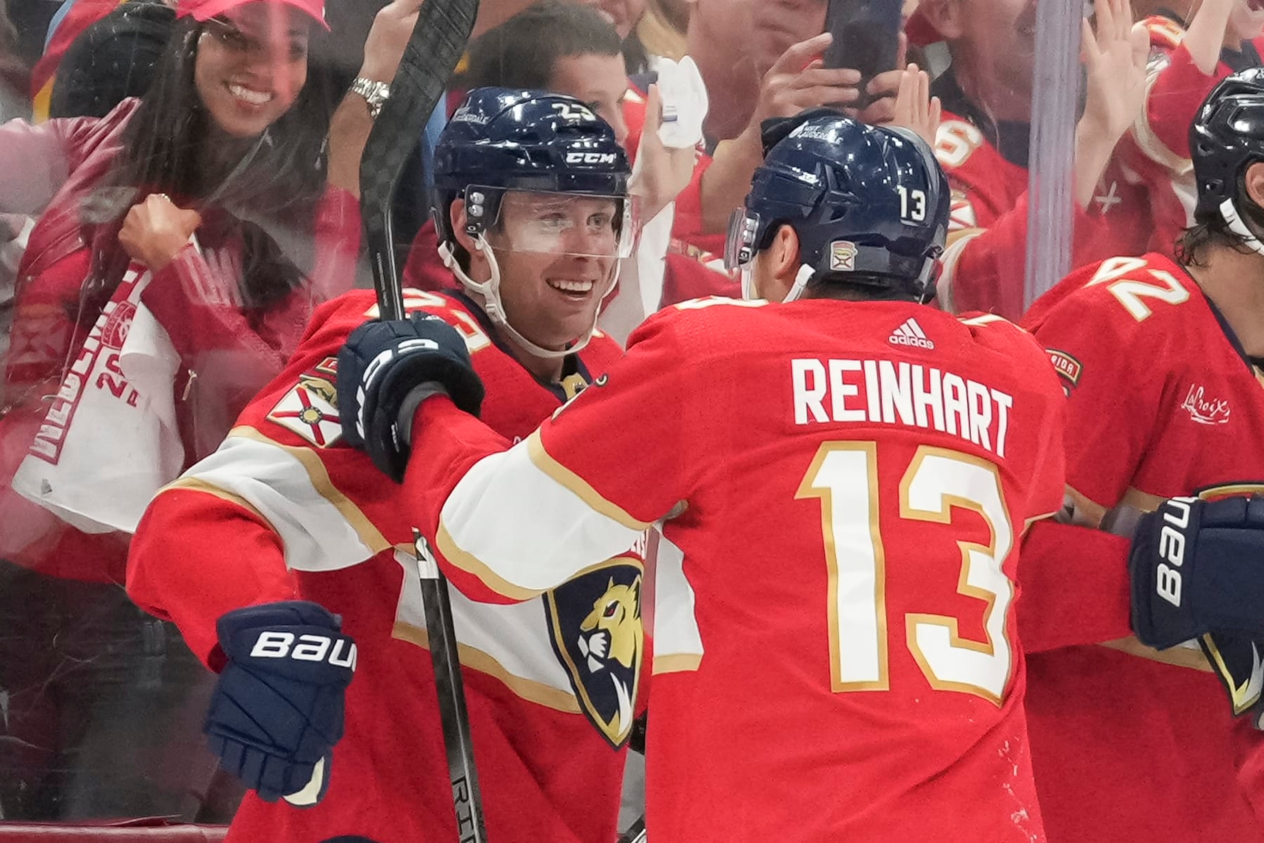 SUNRISE, FL - APRIL 23: Florida Panthers center Carter Verhaeghe (23) celebrates the overtime goal with teammates during game two of the Eastern Conference First Round between the Tampa Bay Lightning and the Florida Panthers at Amerant Bank Arena, Sunrise, Fla. (Photo by Peter Joneleit/Icon Sportswire via Getty Images)