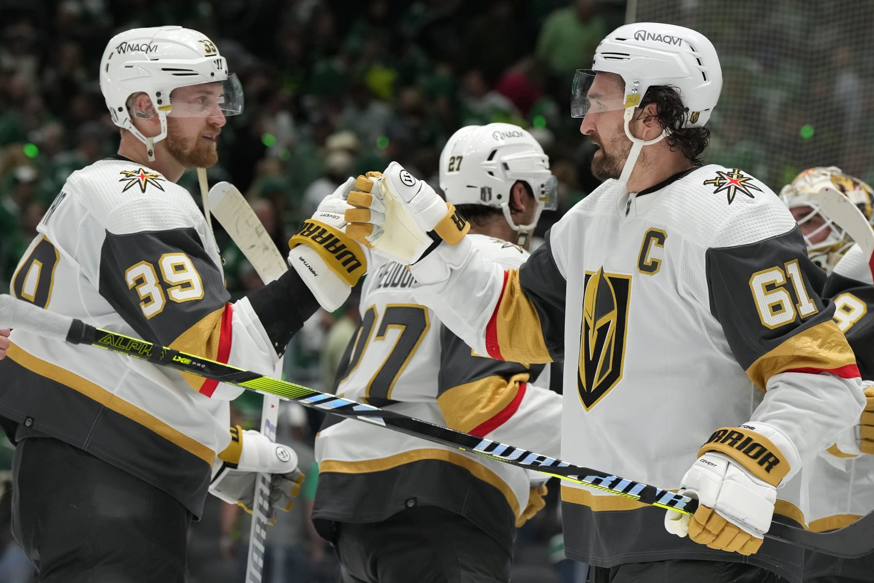 DALLAS, TEXAS - APRIL 22: Mark Stone #61 and Anthony Mantha #39 of the Vegas Golden Knights celebrate a 4-3 win over the Dallas Stars in Game One of the First Round of the 2024 Stanley Cup Playoffs at the American Airlines Center on April 22, 2024 in Dallas, Texas.  (Photo by Sam Hodde/Getty Images)