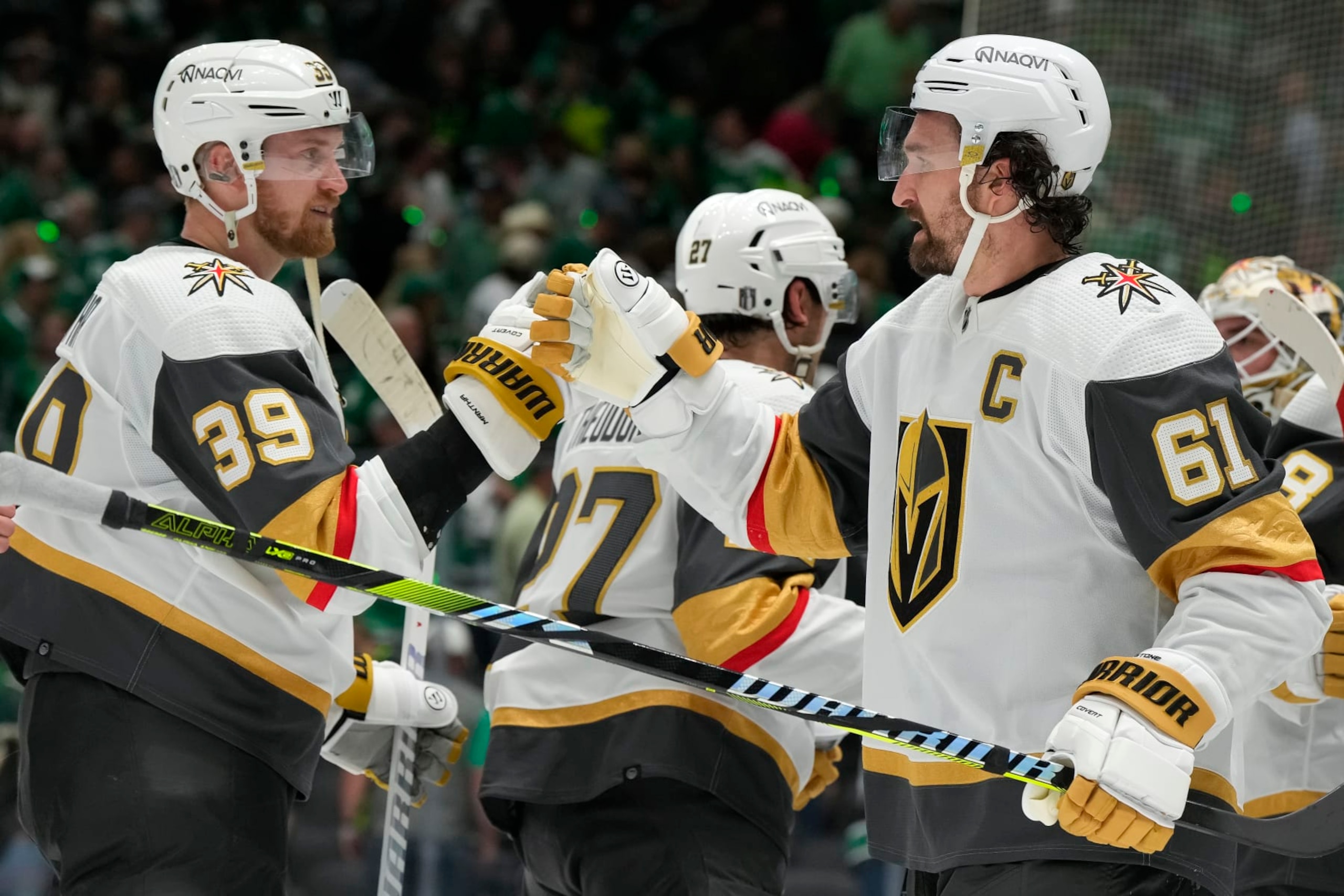 DALLAS, TEXAS - APRIL 22: Mark Stone #61 and Anthony Mantha #39 of the Vegas Golden Knights celebrate a 4-3 win over the Dallas Stars in Game One of the First Round of the 2024 Stanley Cup Playoffs at the American Airlines Center on April 22, 2024 in Dallas, Texas.  (Photo by Sam Hodde/Getty Images)