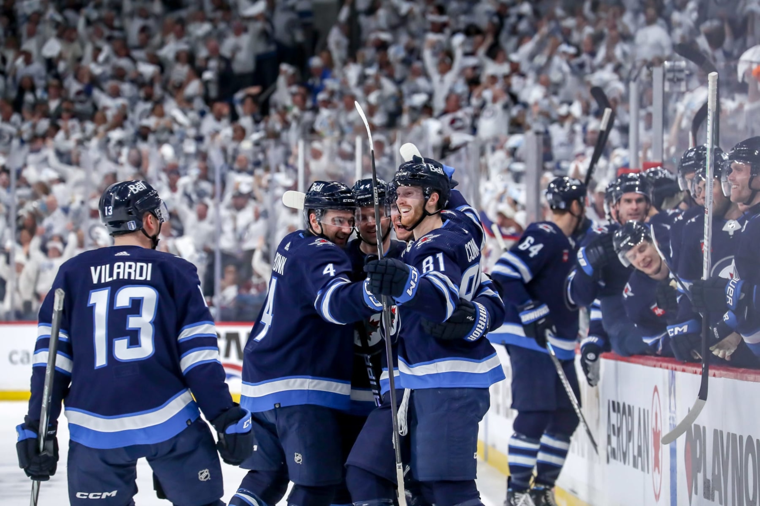 WINNIPEG, CANADA - APRIL 23: Gabriel Vilardi #13 of the Winnipeg Jets joins teammates Neal Pionk #4, Josh Morrissey #44, Mark Scheifele #55 and Kyle Connor #81 as they celebrate a second period goal against the Colorado Avalanche in Game Two of the First Round of the 2024 Stanley Cup Playoffs at the Canada Life Centre on April 23, 2024 in Winnipeg, Manitoba, Canada. (Photo by Darcy Finley/NHLI via Getty Images)