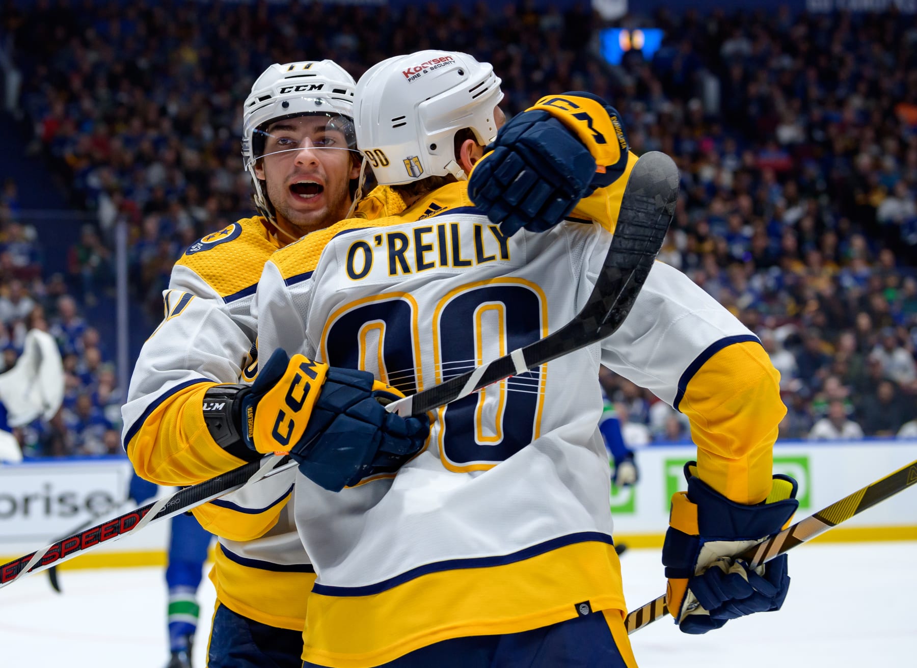 VANCOUVER, CANADA - APRIL 21: Ryan O'Reilly #90 of the Nashville Predators celebrates his second-period goal with Luke Evangelista #77 against the Vancouver Canucks of Game One of the First Round of the 2024 Stanley Cup Playoffs at Rogers Arena on April 21, 2024 in Vancouver, British Columbia, Canada. (Photo by Derek Cain/Getty Images)